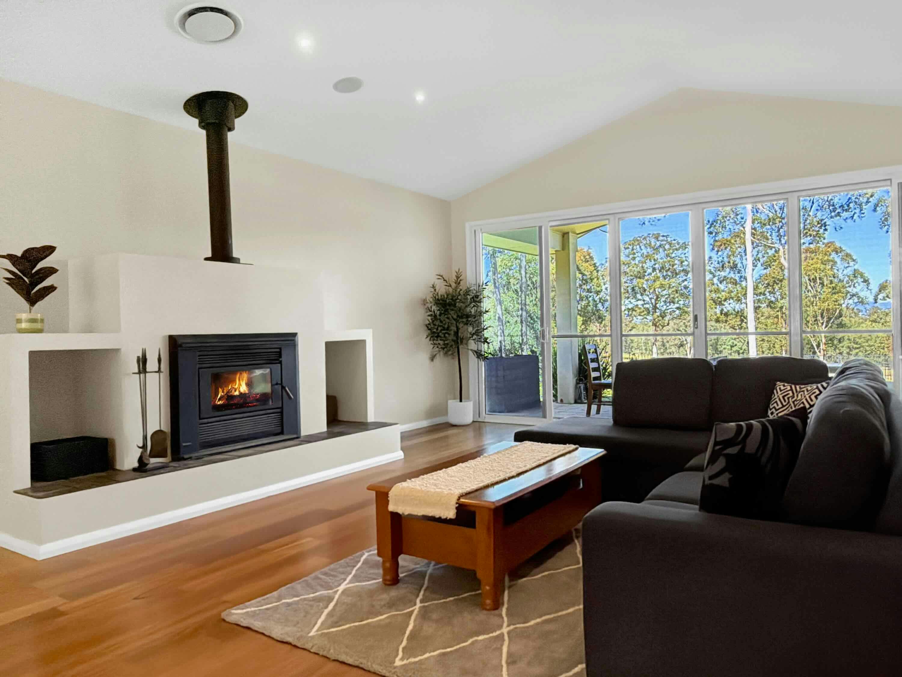 Lounge room with fireplace - Manor