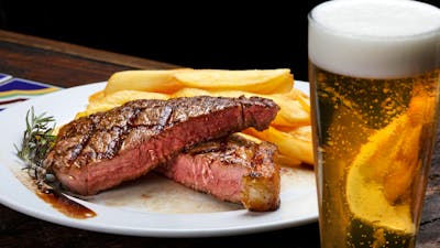 Steak with fries and beer