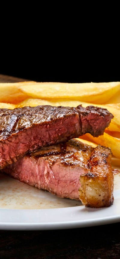 Steak with fries and beer