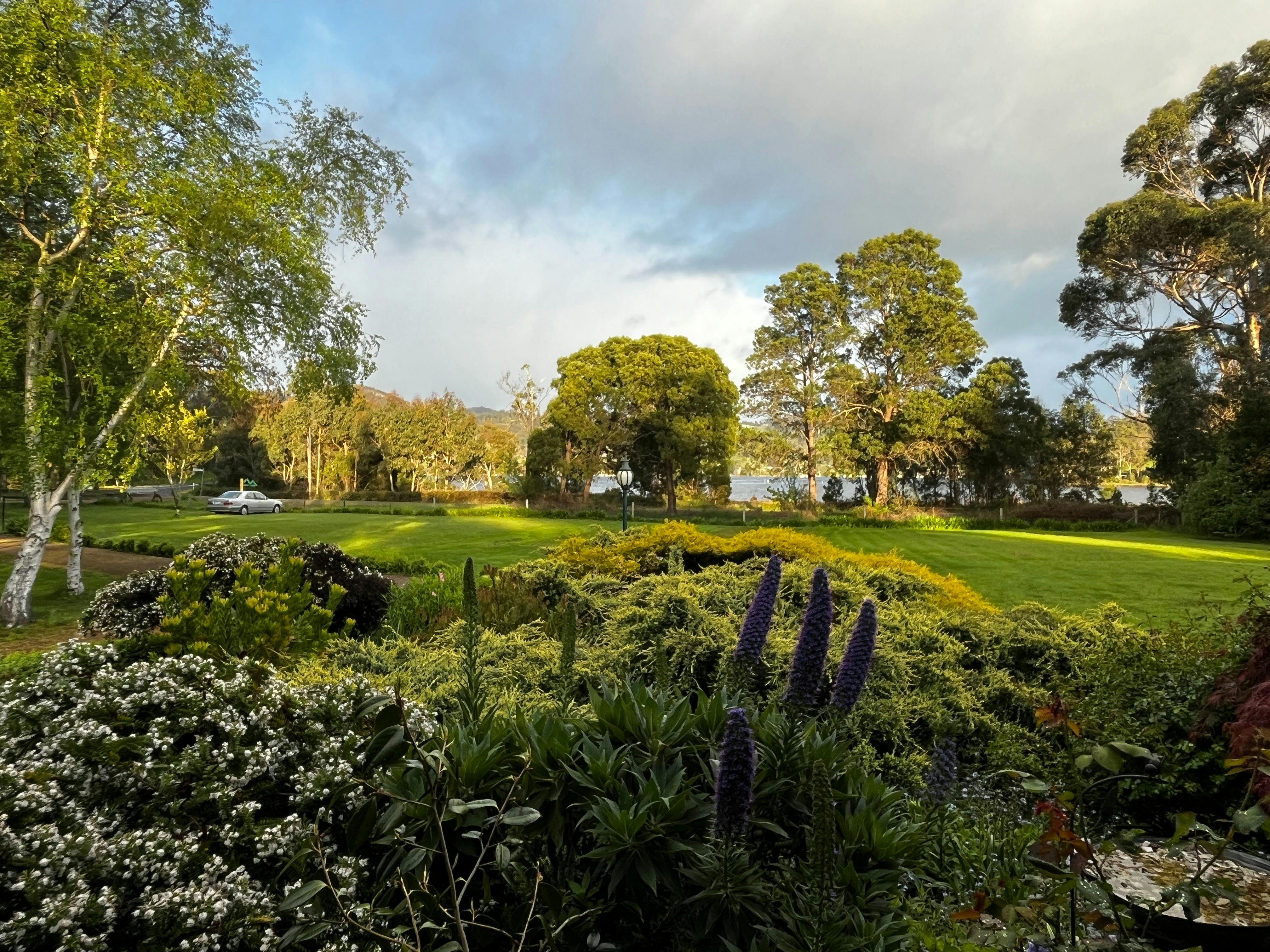 View of the garden and Cygnet Bay at Green Gables B&B