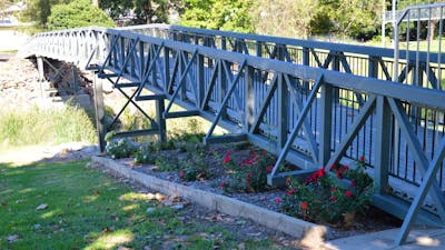 Two footbridges connect Caravan park to the main street, a swinging bridge and a rigid bridge