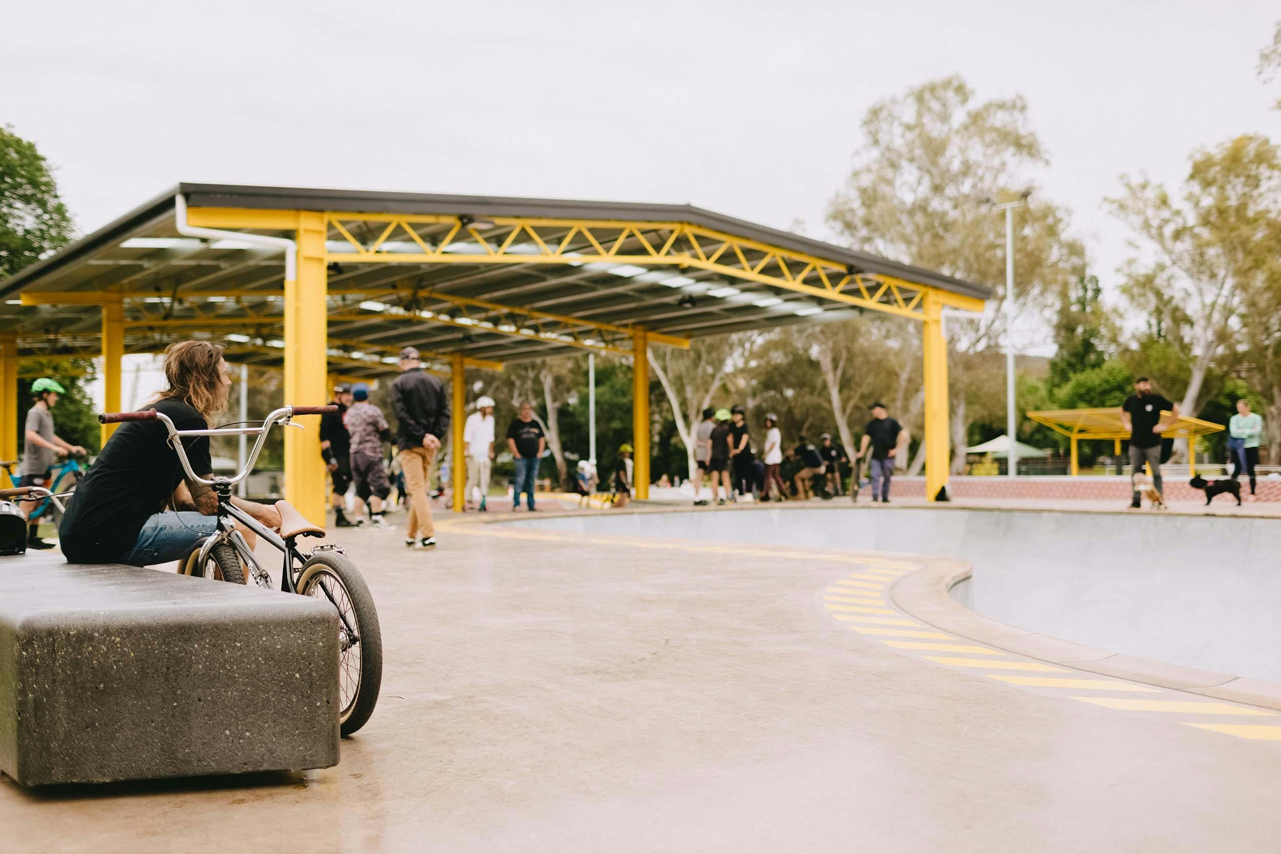 View of  lots of people under the shelter at the Albury Skate Park