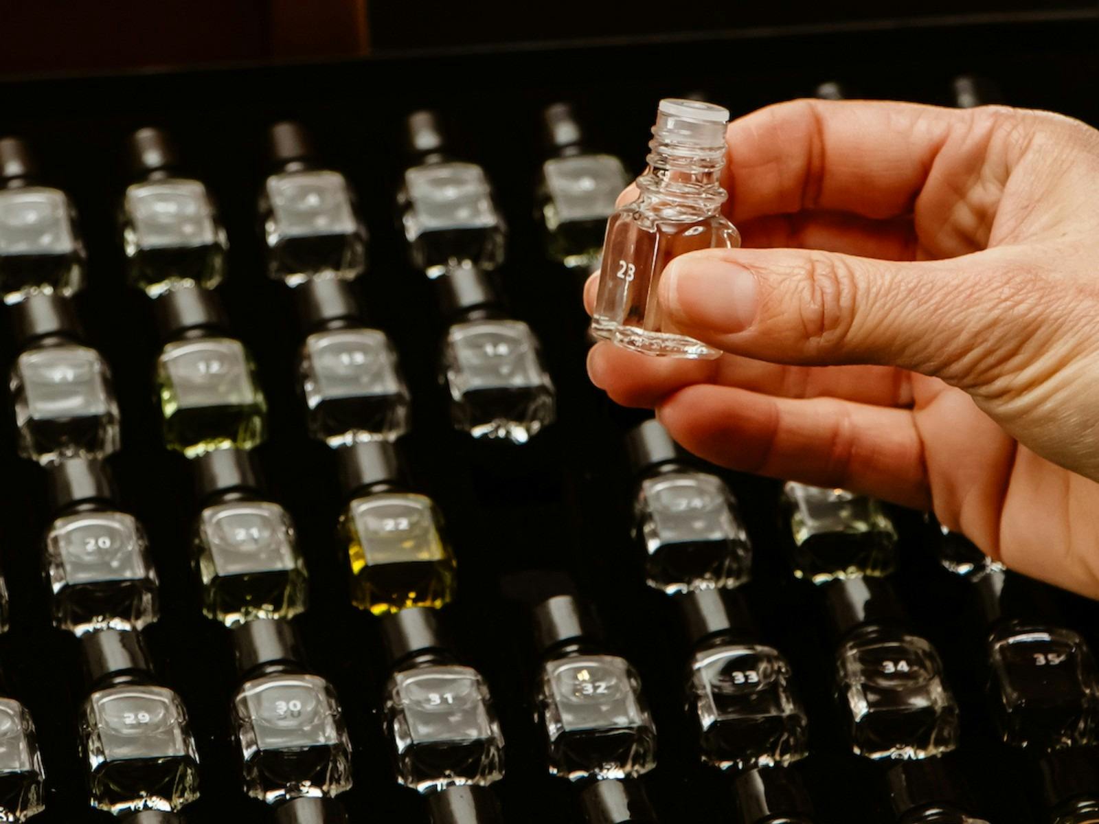 Guest reaching for a Le Nez du Vin aroma bottle.