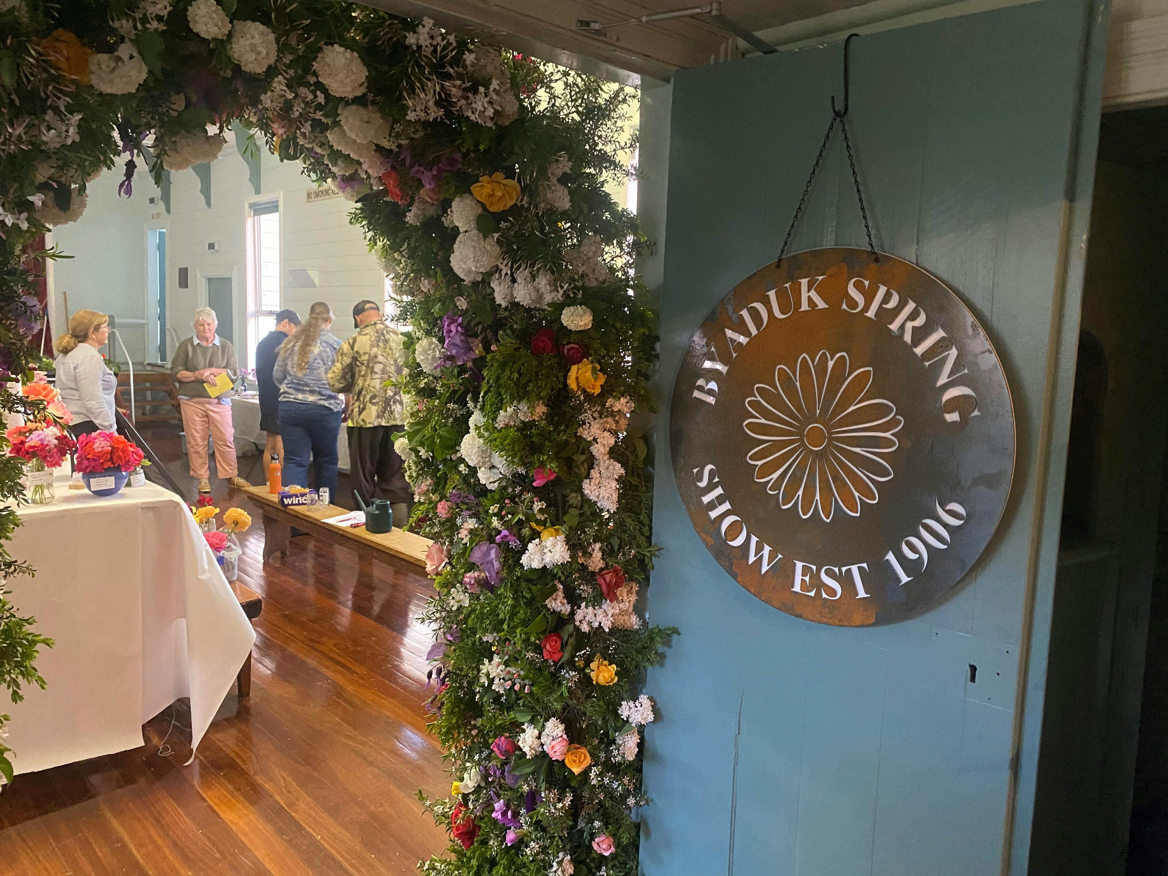 Floral art and metal sign spring show