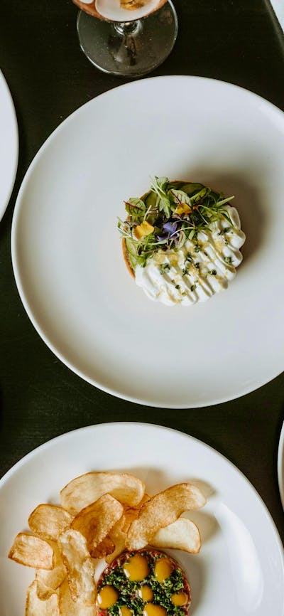 A variety of dishes placed on a table.