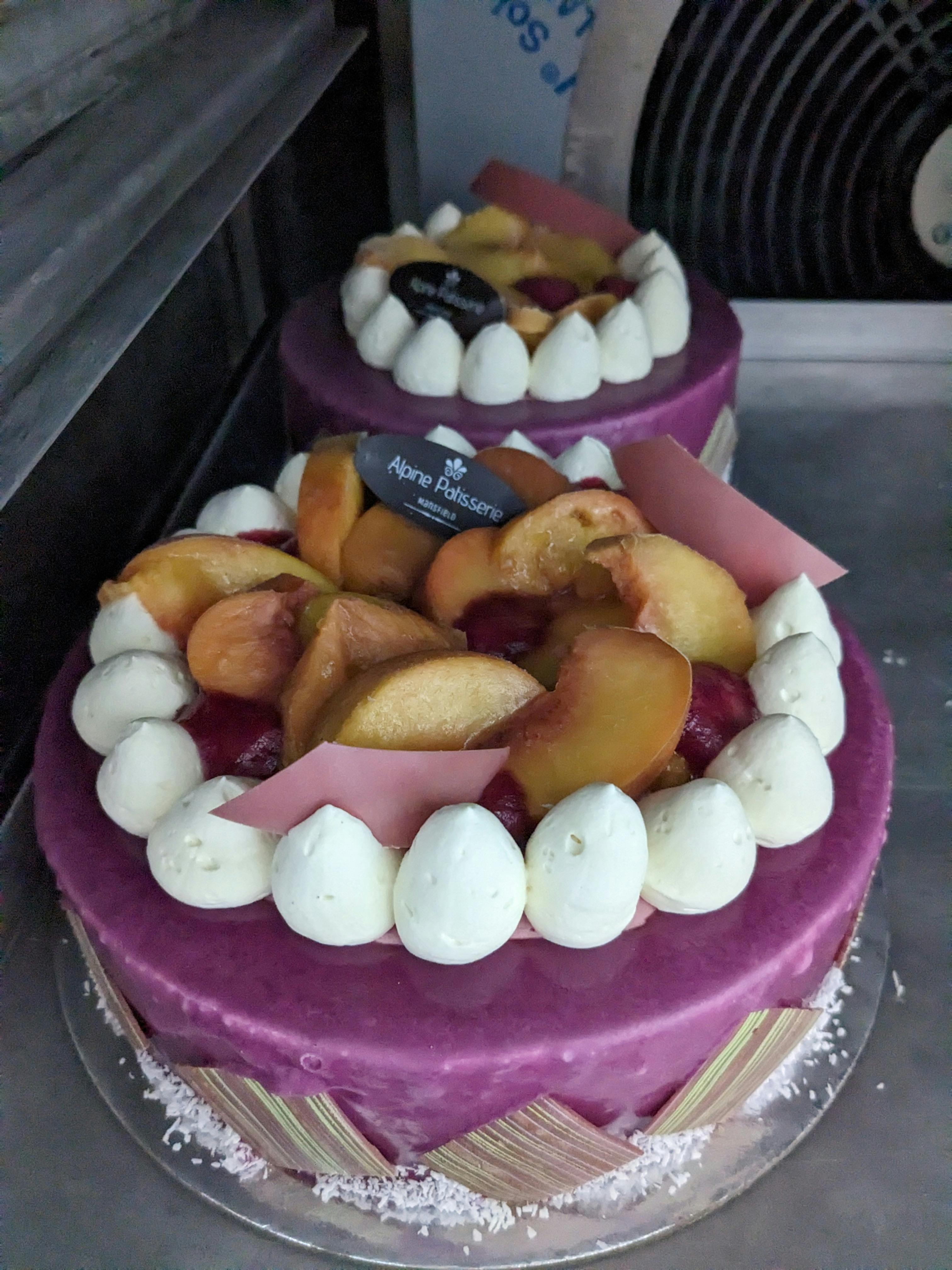 Layers of sponge and Mousse using peaches and blueberries