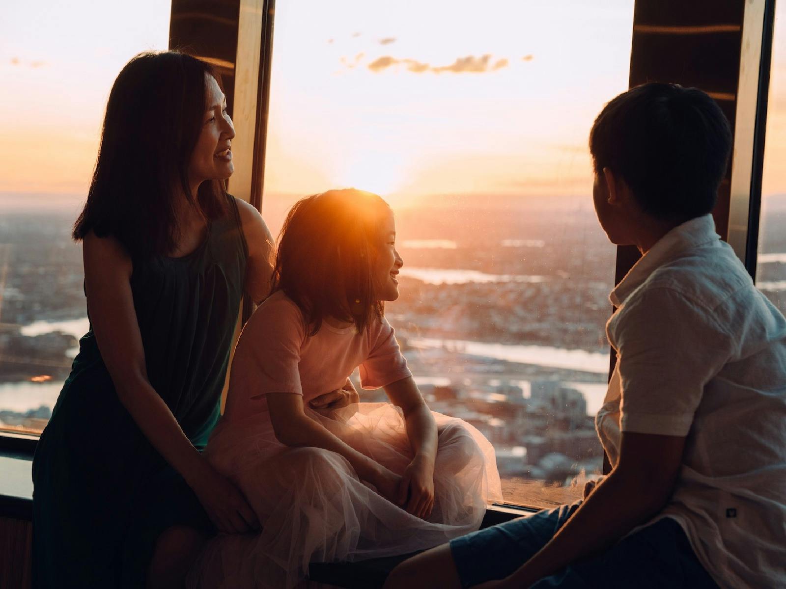 Golden hour! Guests watching the sunset from the Observation Deck at Sydney Tower Eye