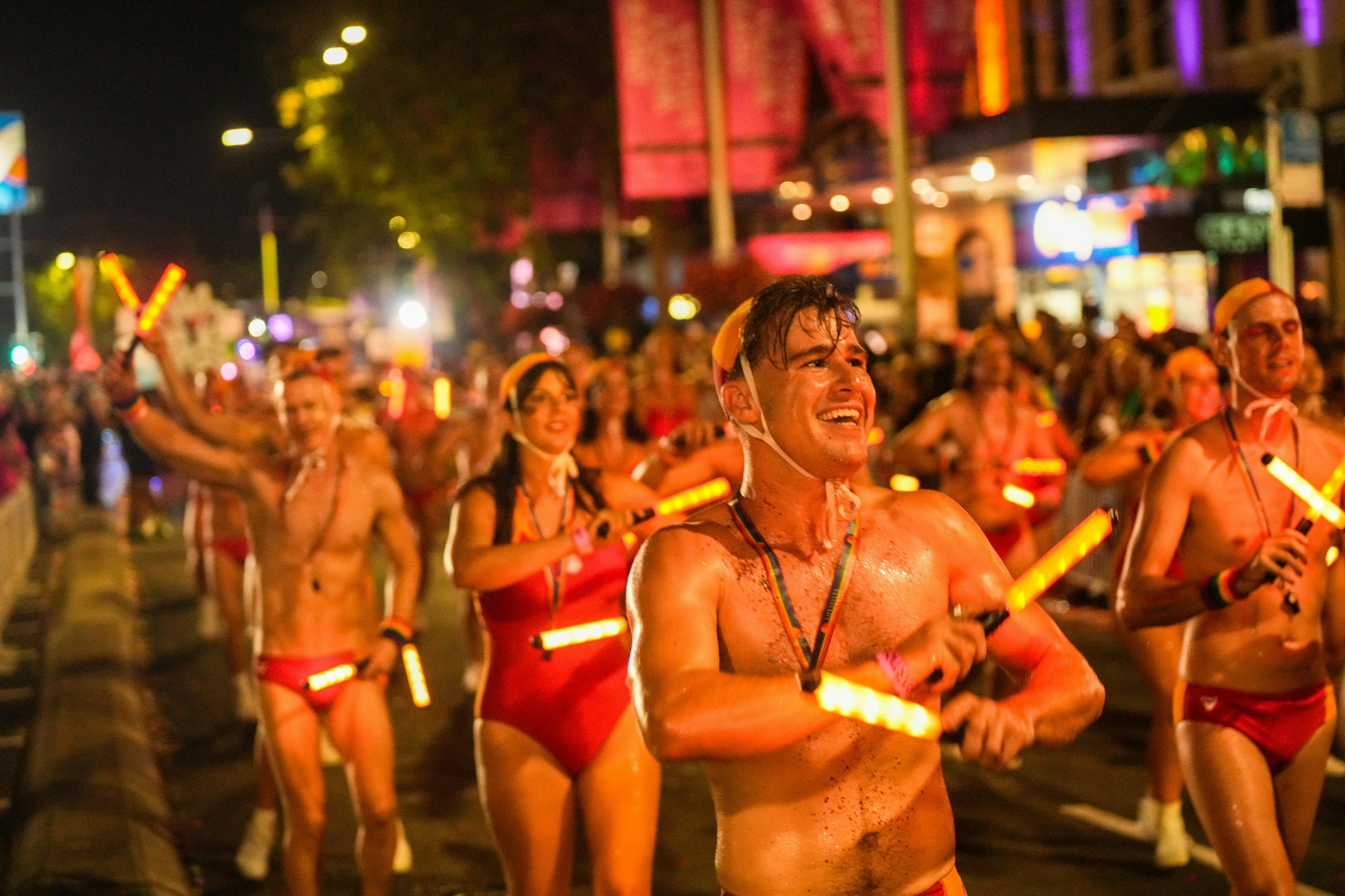 Surf Life Saving NSW marching in the Sydney Gay and Lesbian Mardi Gras parade