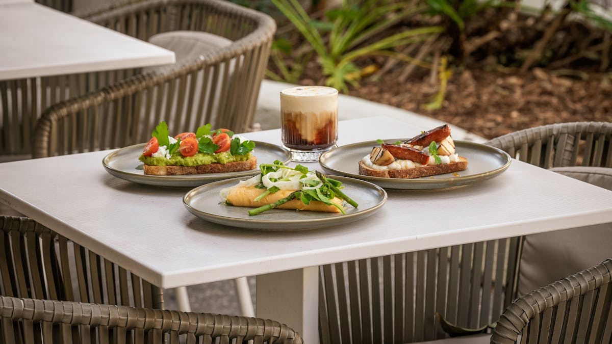 Breakfast spread outdoors at Mews