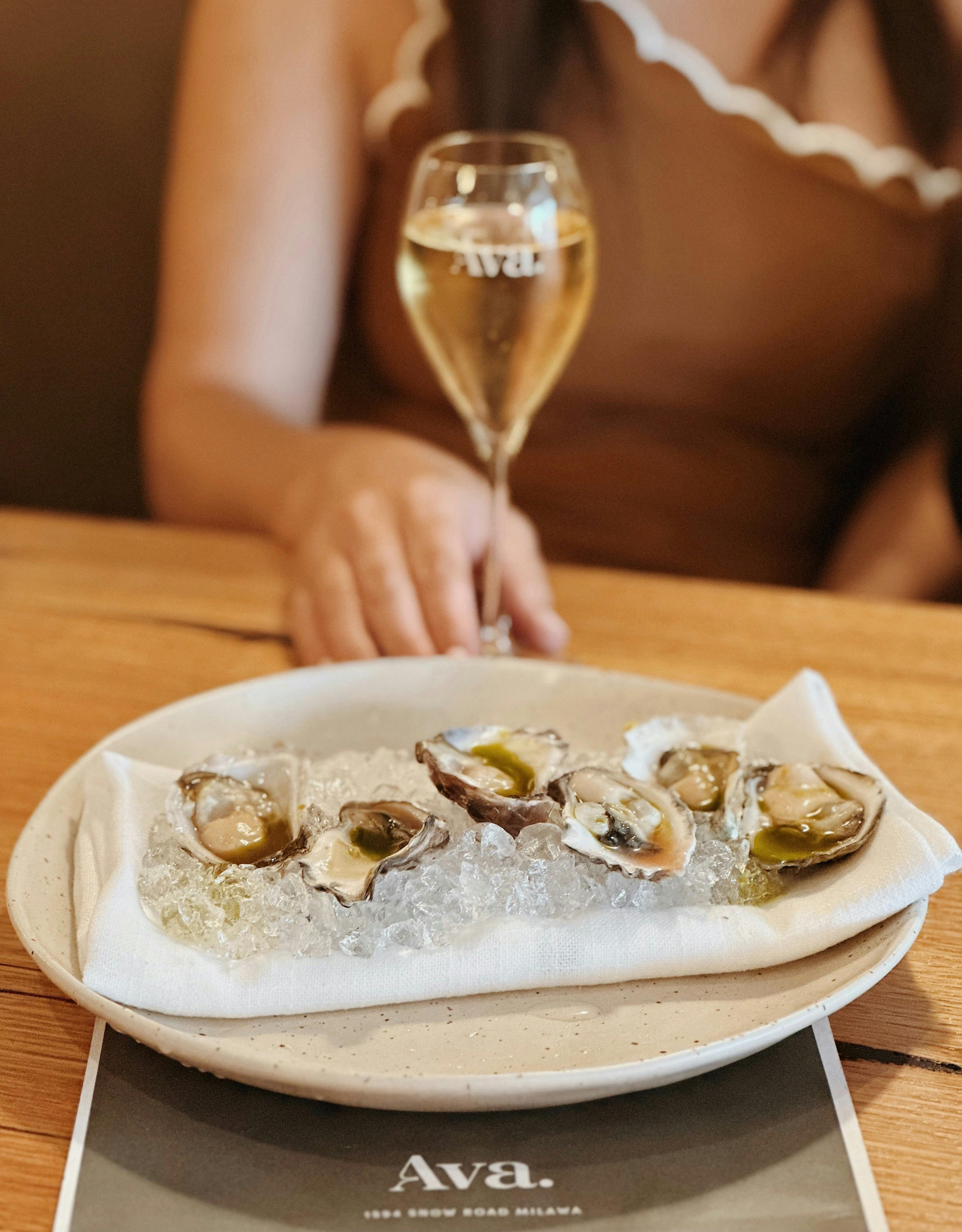 Oysters, natrual or with seasonal dressing