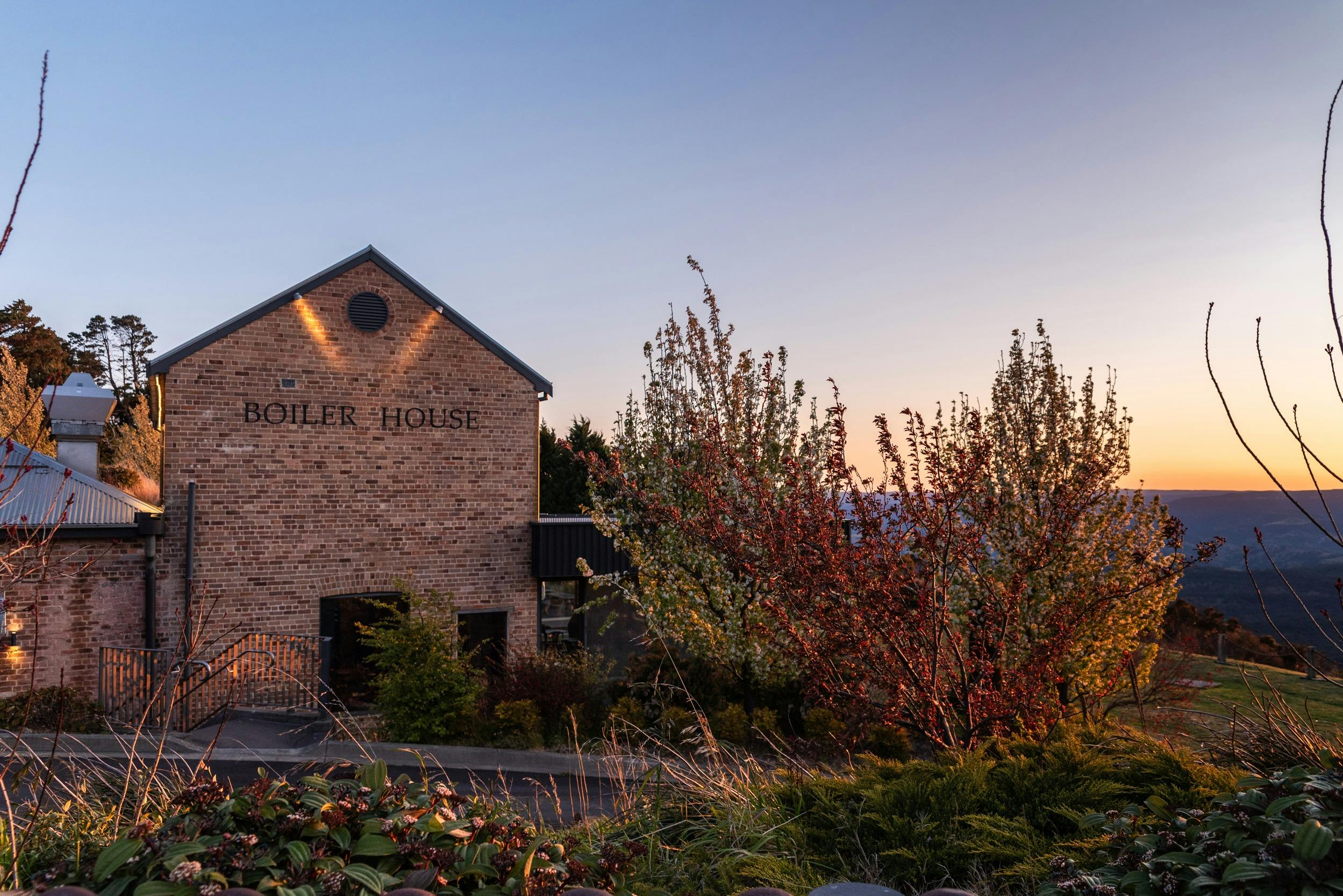 brick exterior of heritage building in sunset