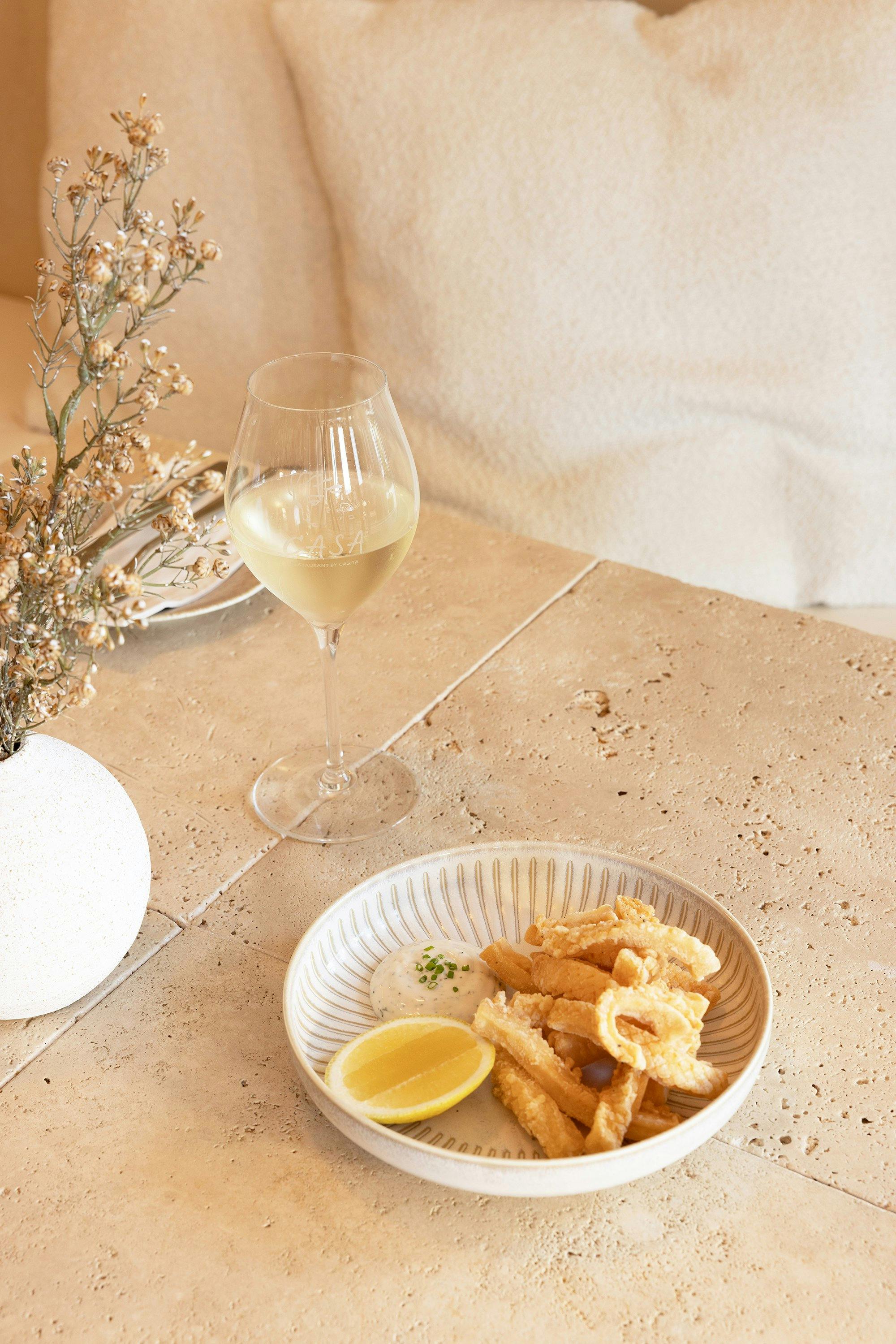 Calamari & Glass of Reisling