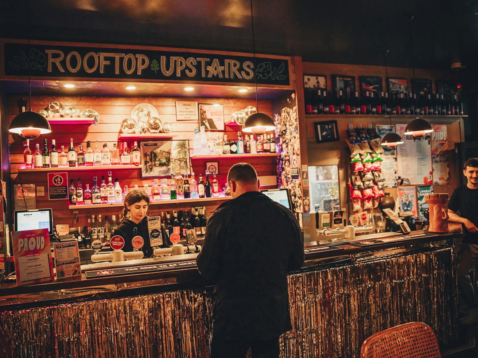 Man standing at bar