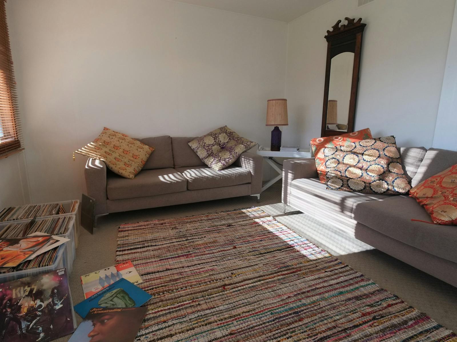 Two couches in living area away from television for relaxing.