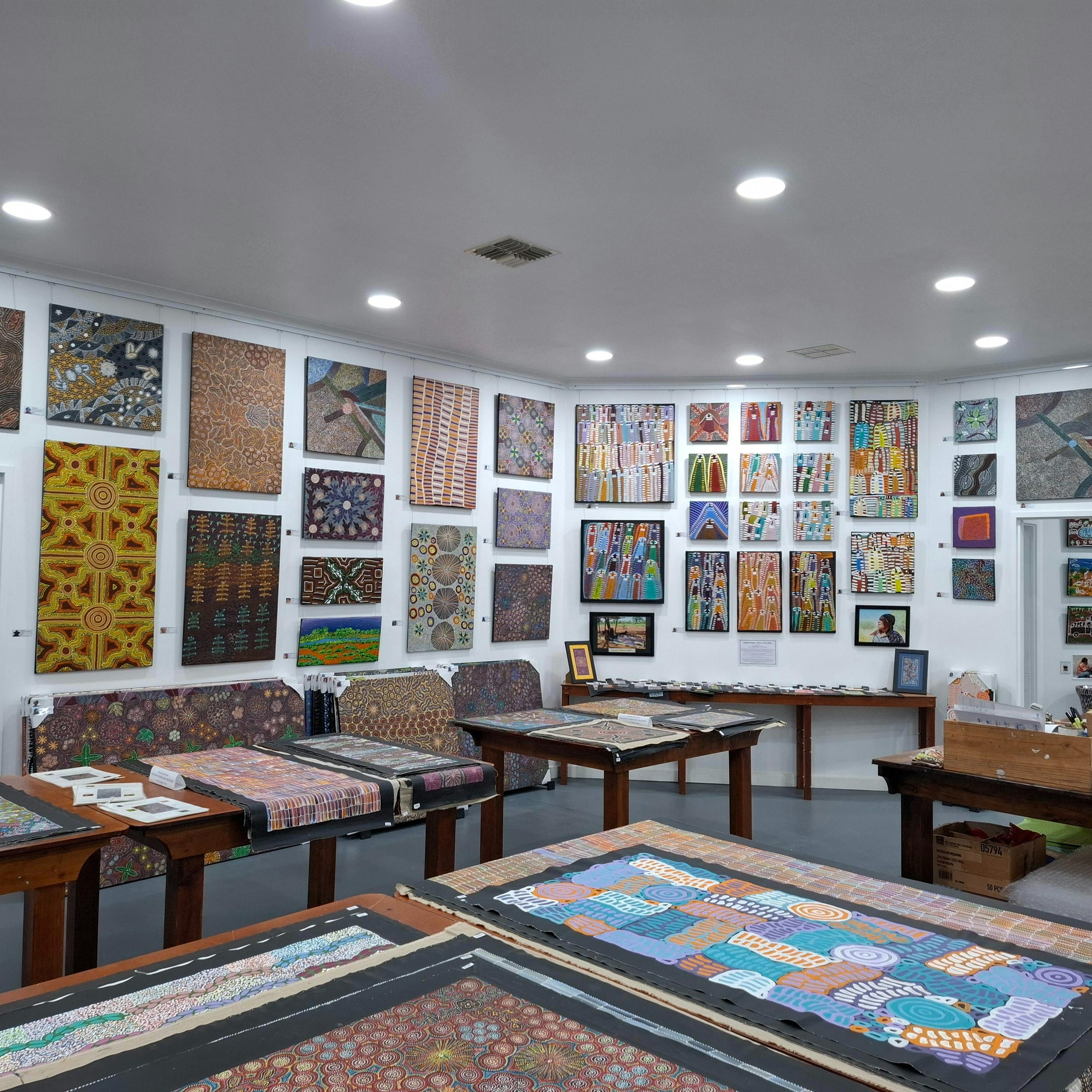Monthly feature artist display, loose paintings, artifacts, Zebra stone, cultural information