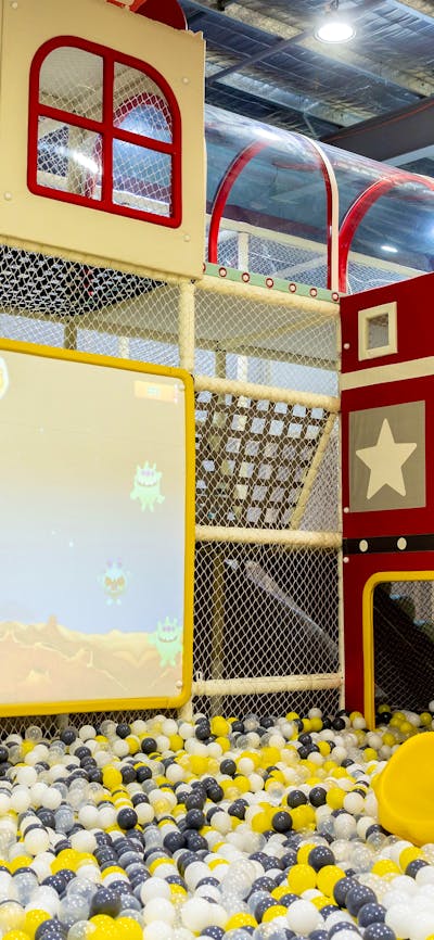 interactive screen and ball pit