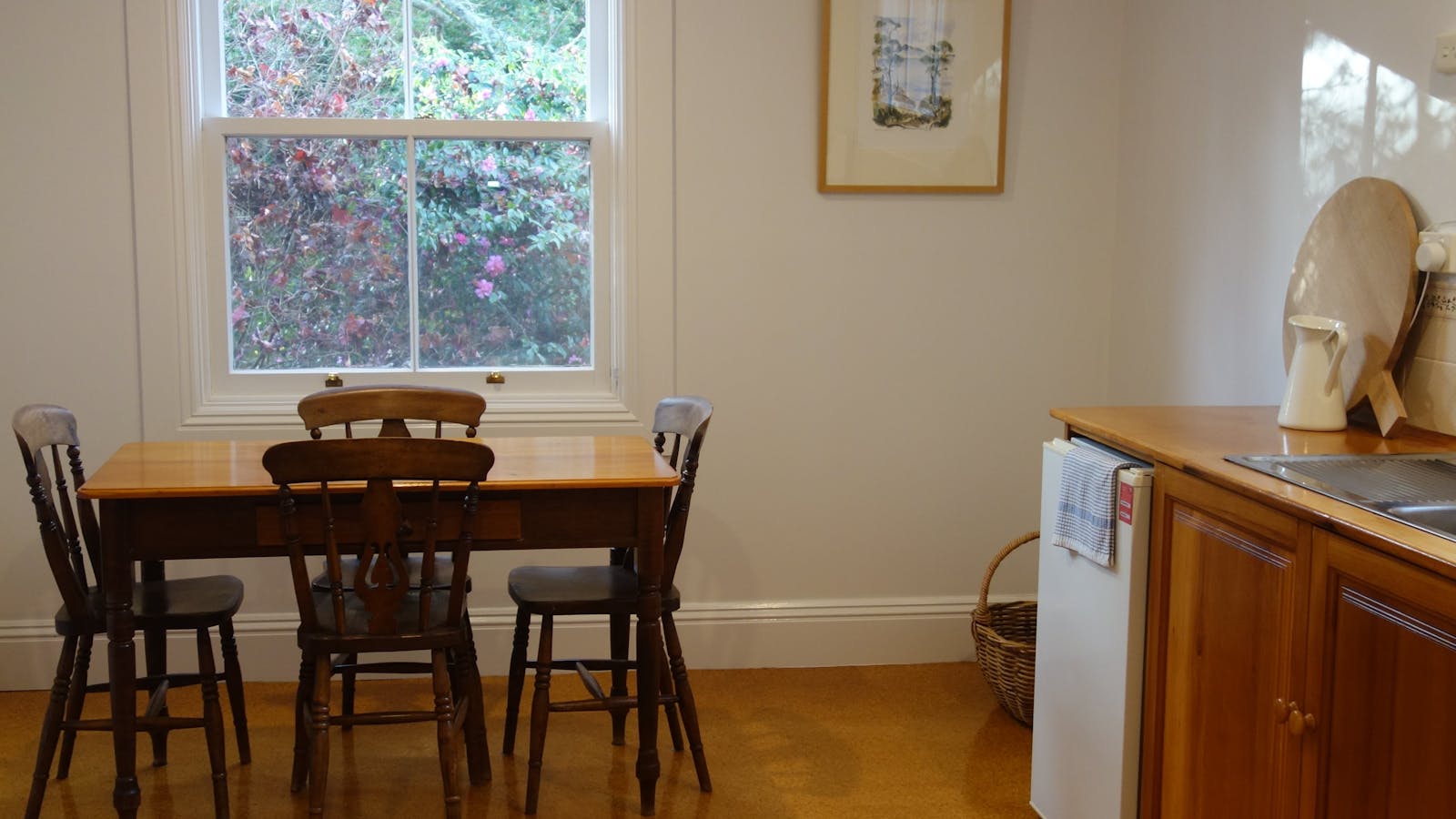 Kitchen with kettle, microwave, oven and refrigerator