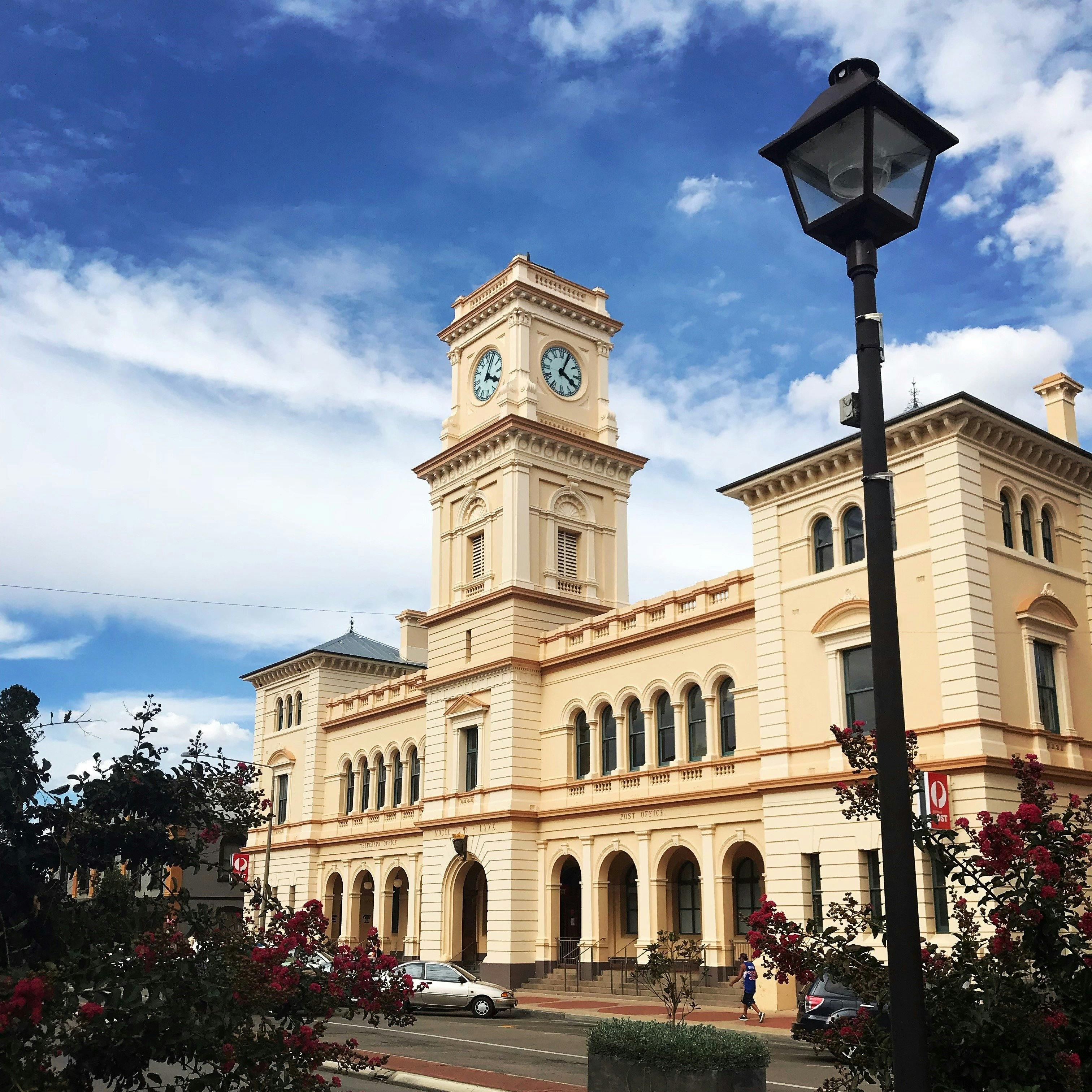 Front of Goulburn Post Office with Light Post and bushes
