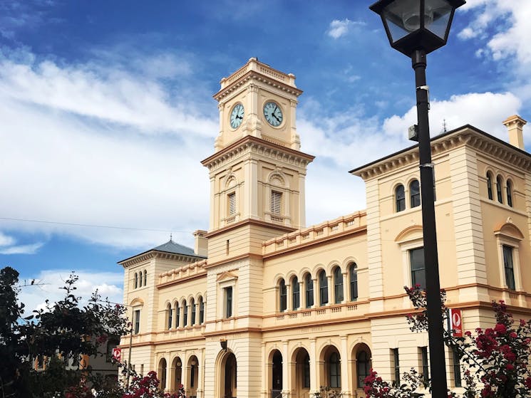 Front of Goulburn Post Office with Light Post and bushes