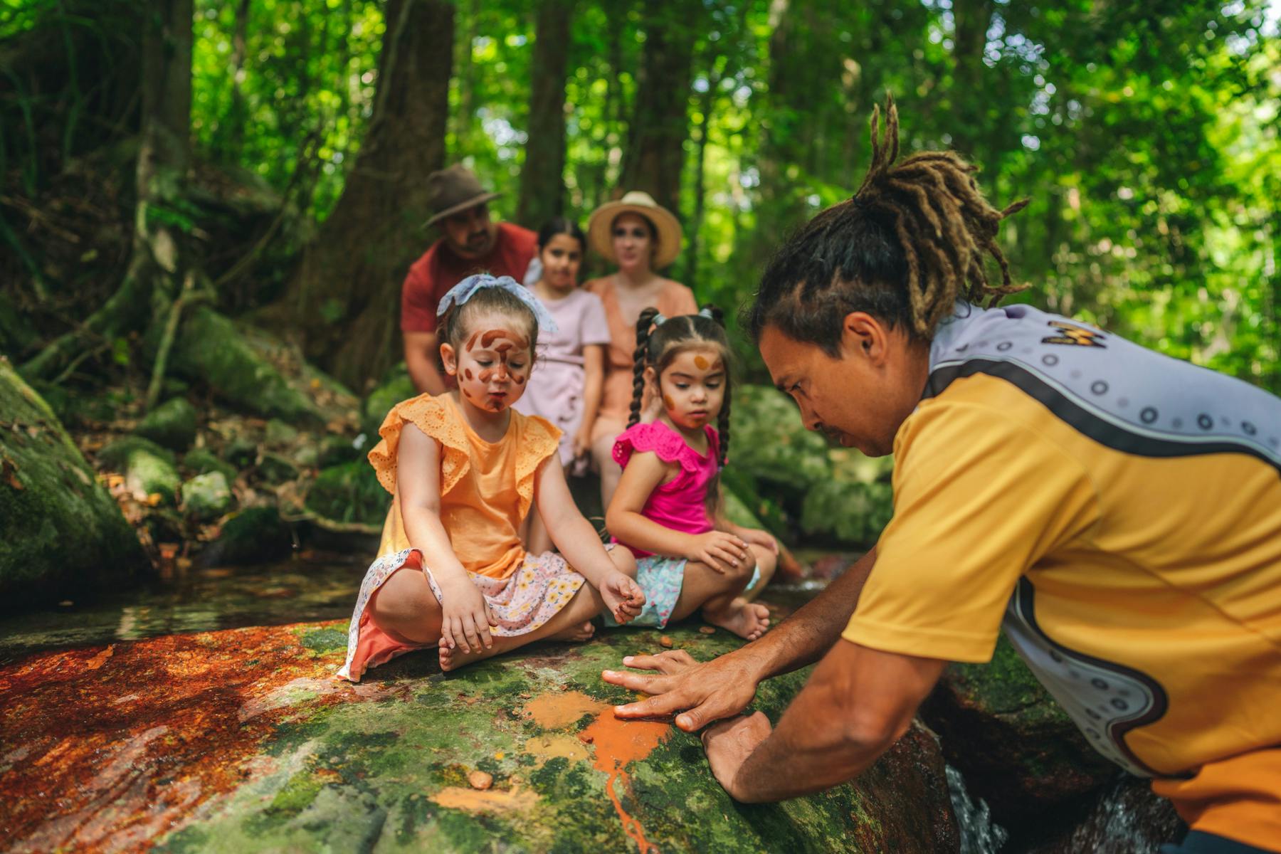 Learning about natural resources with Walkabout Cultural Adventures Aboriginal guide