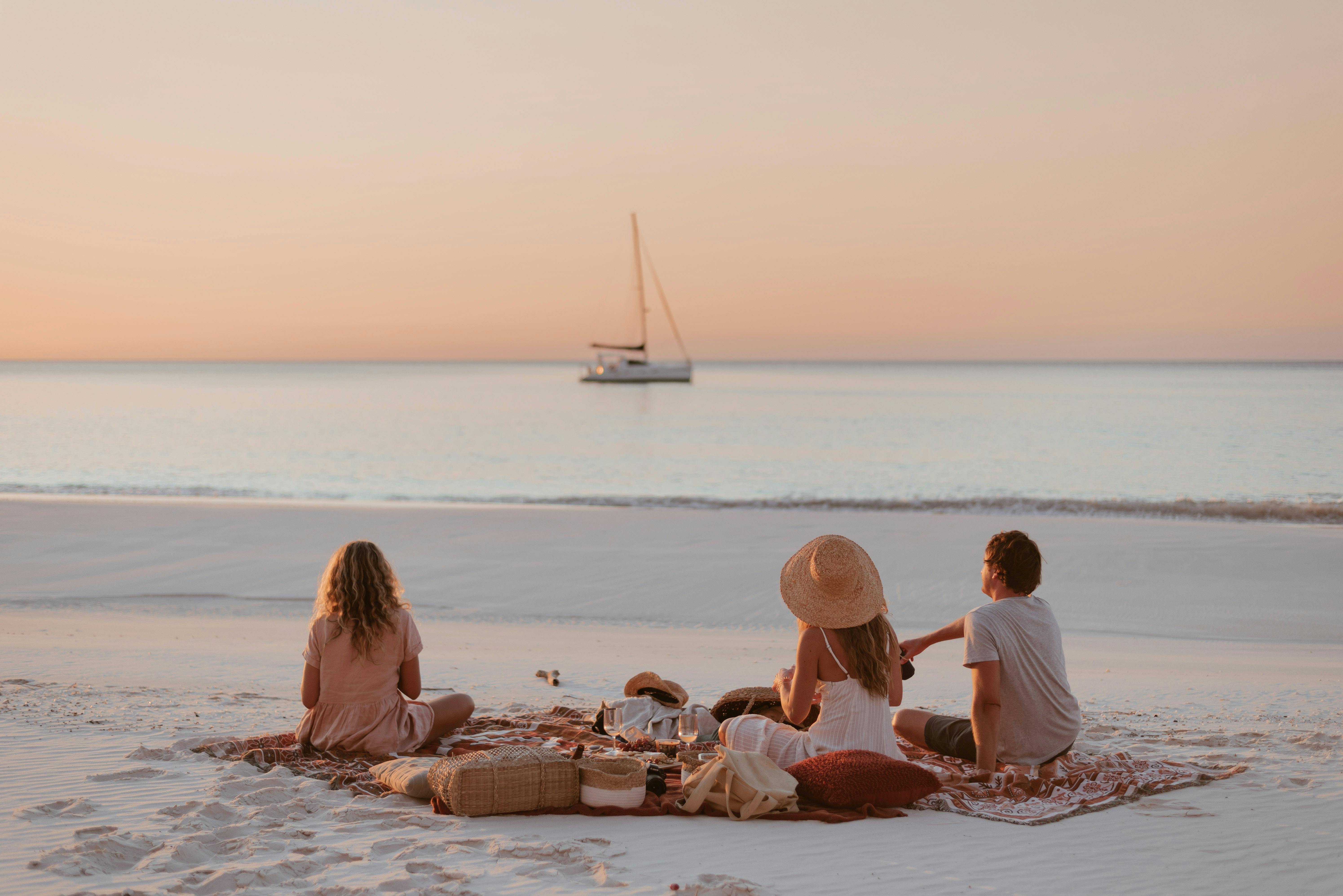 Sunset picnic over the ocean Fraser Island
