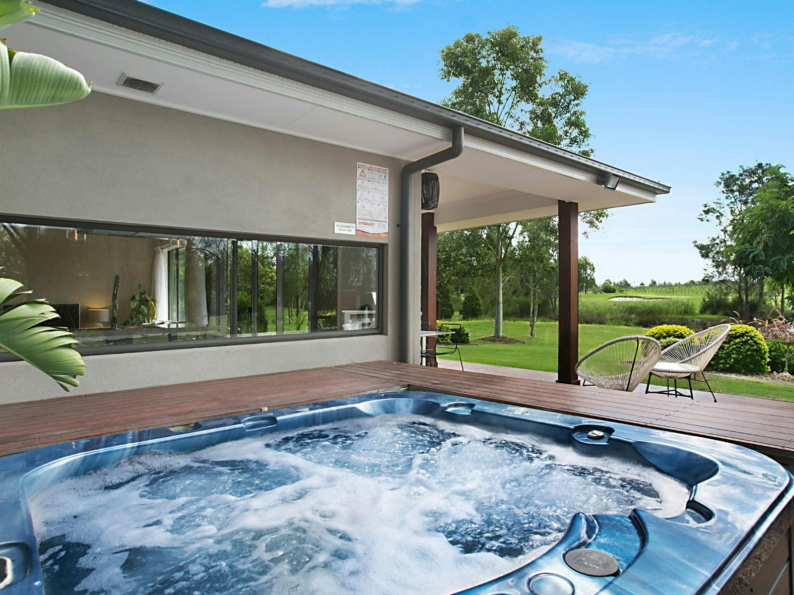 1OAK hot tub and outdoor entertainment area