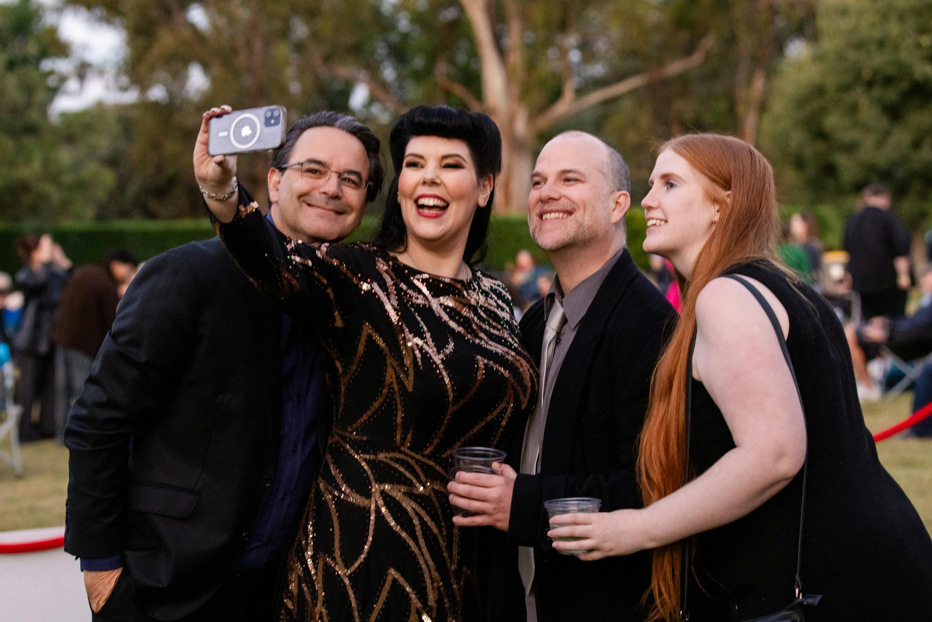 Group of people smiling to camera together