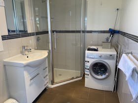 Shower, toilet, basin, washing machine + basket & pegs