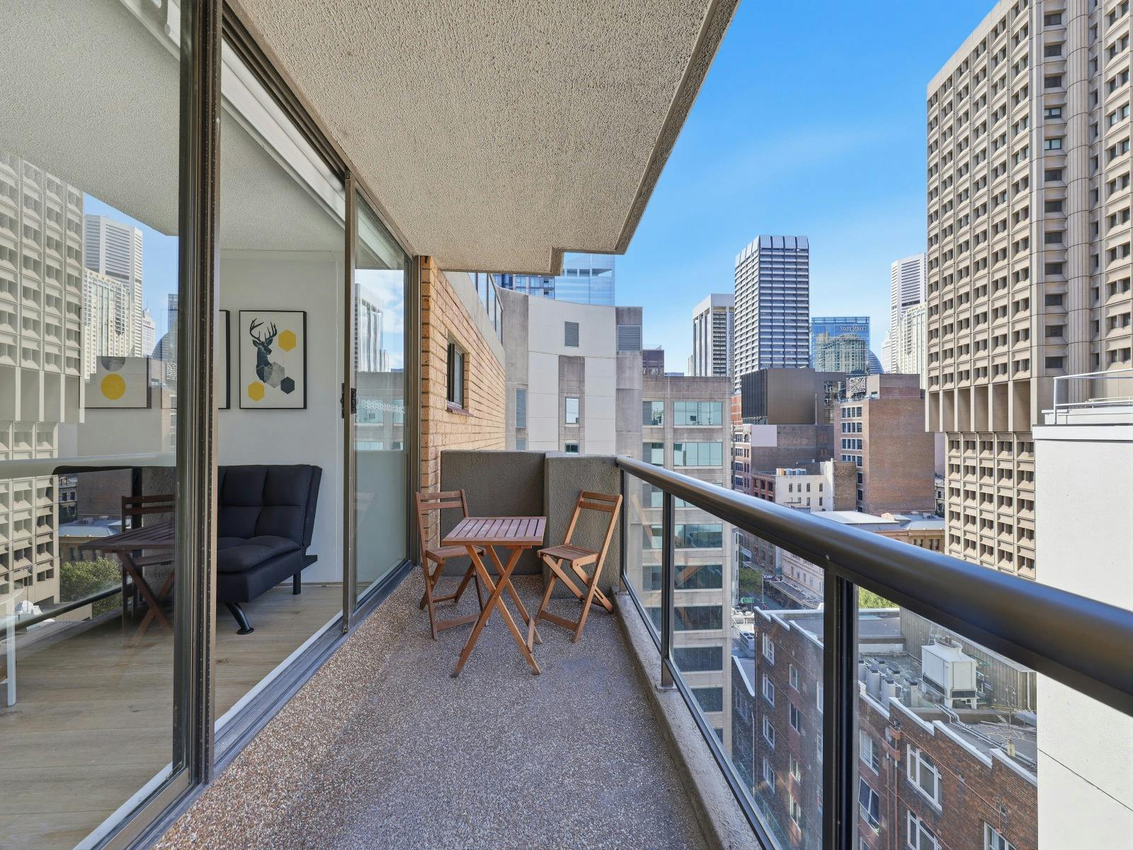 Balcony with city views and outdoor seating