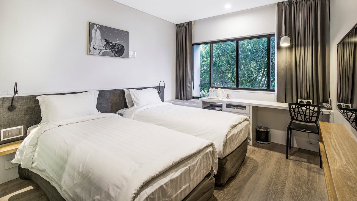 Therapeutic twin single mattresses with pillow down top, goose down pillows and duvet.