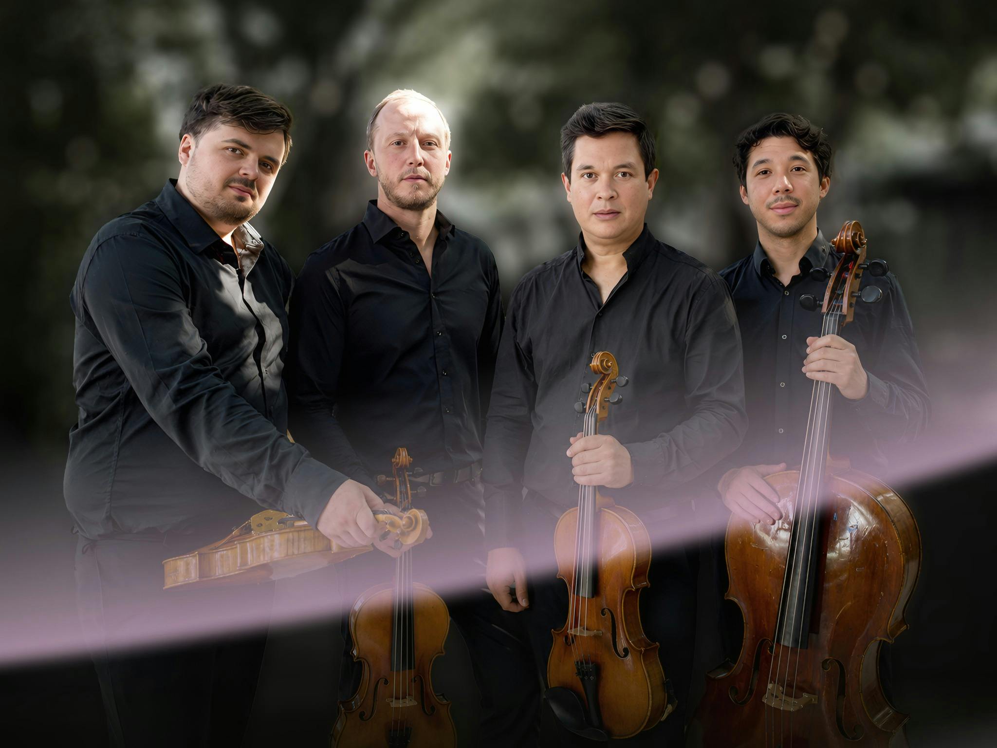 The four members of Quatuor Van Kuijk with their violins, viola and cello