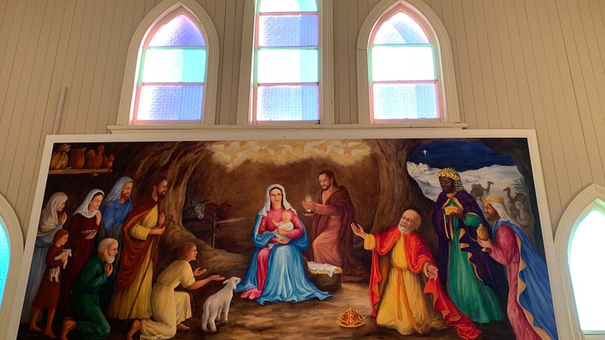 Interior view of mural and stained glass windows