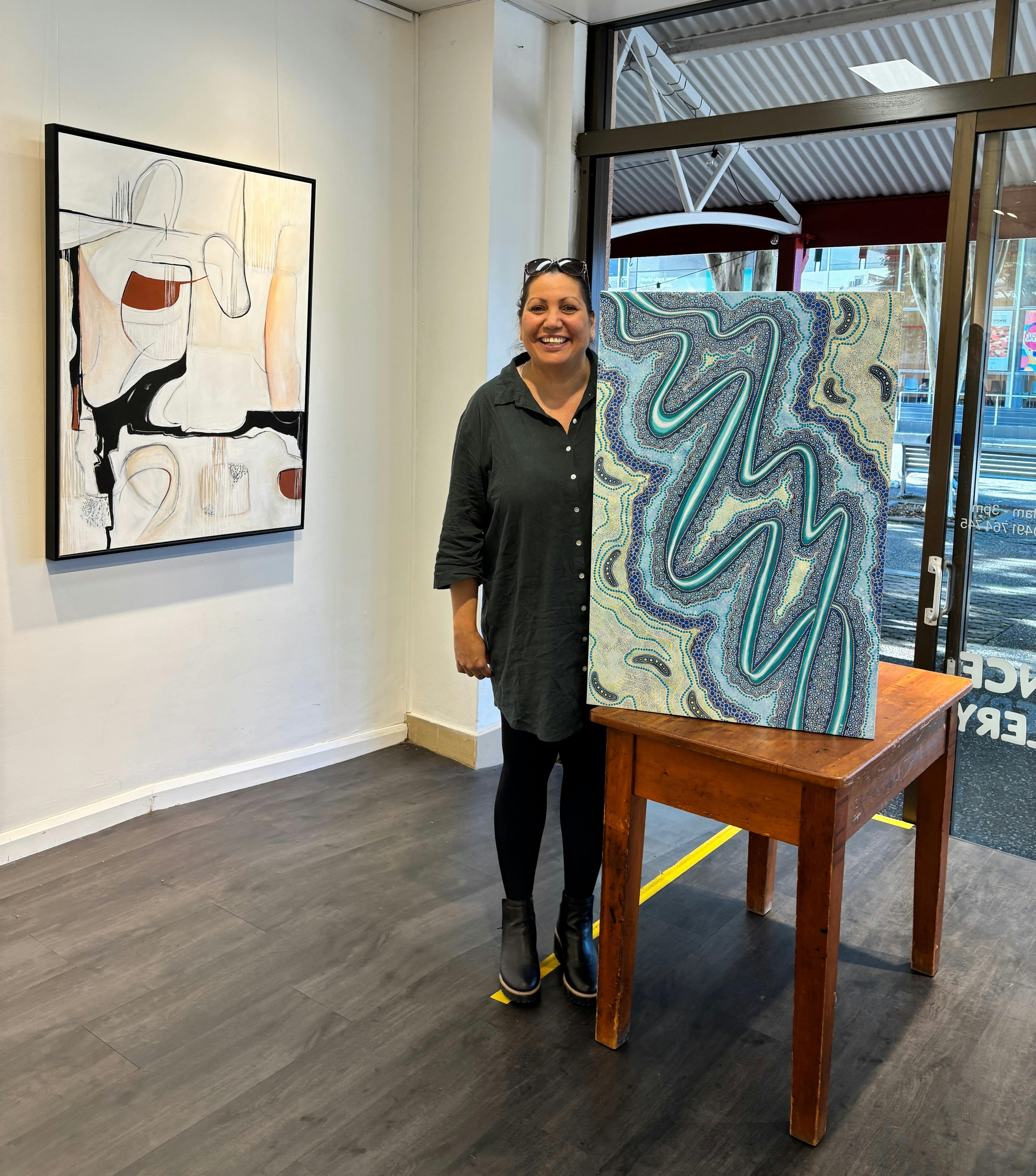 Artist Rachel Cross with artwork called Shallows.