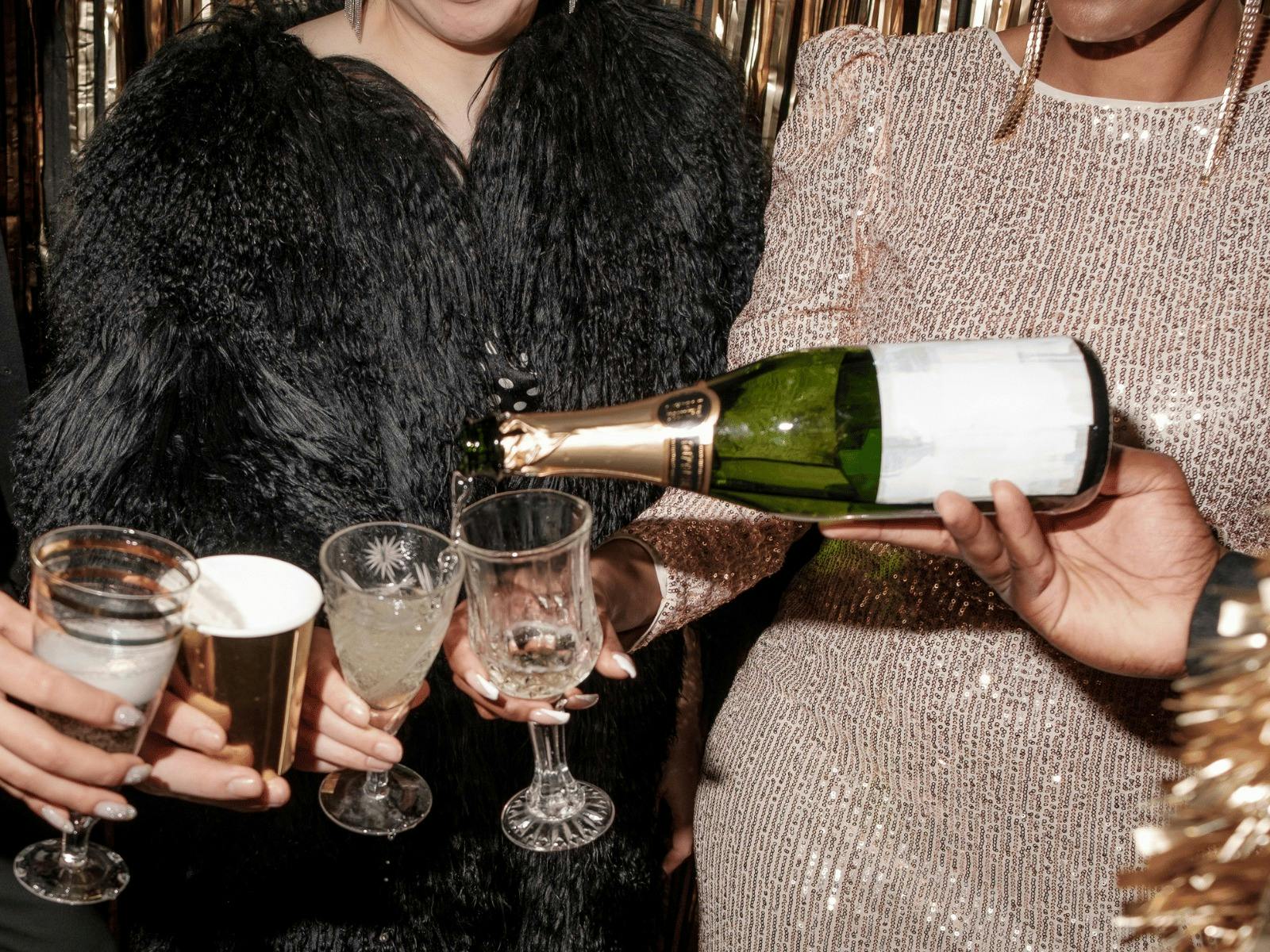 Group of guests enjoying a Sparkling Wine and Celebrating the New Year