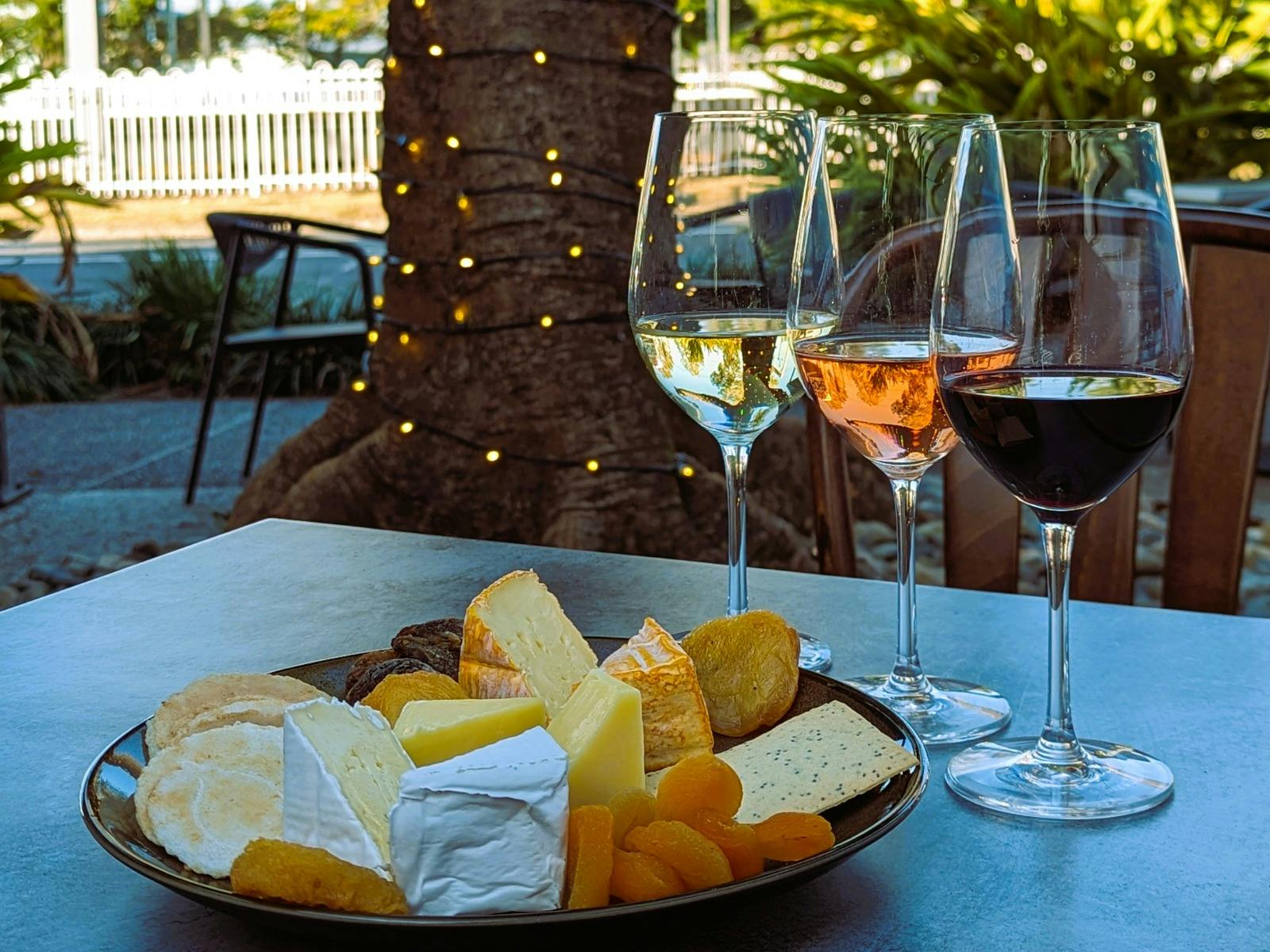 Cheese plate with 3 glasses of wine
