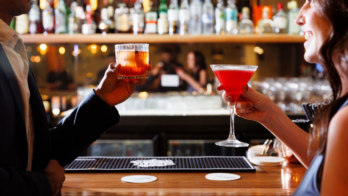 Couple enjoining a drink at Lennons Restaurant & Bar, Hyatt Regency Brisbane