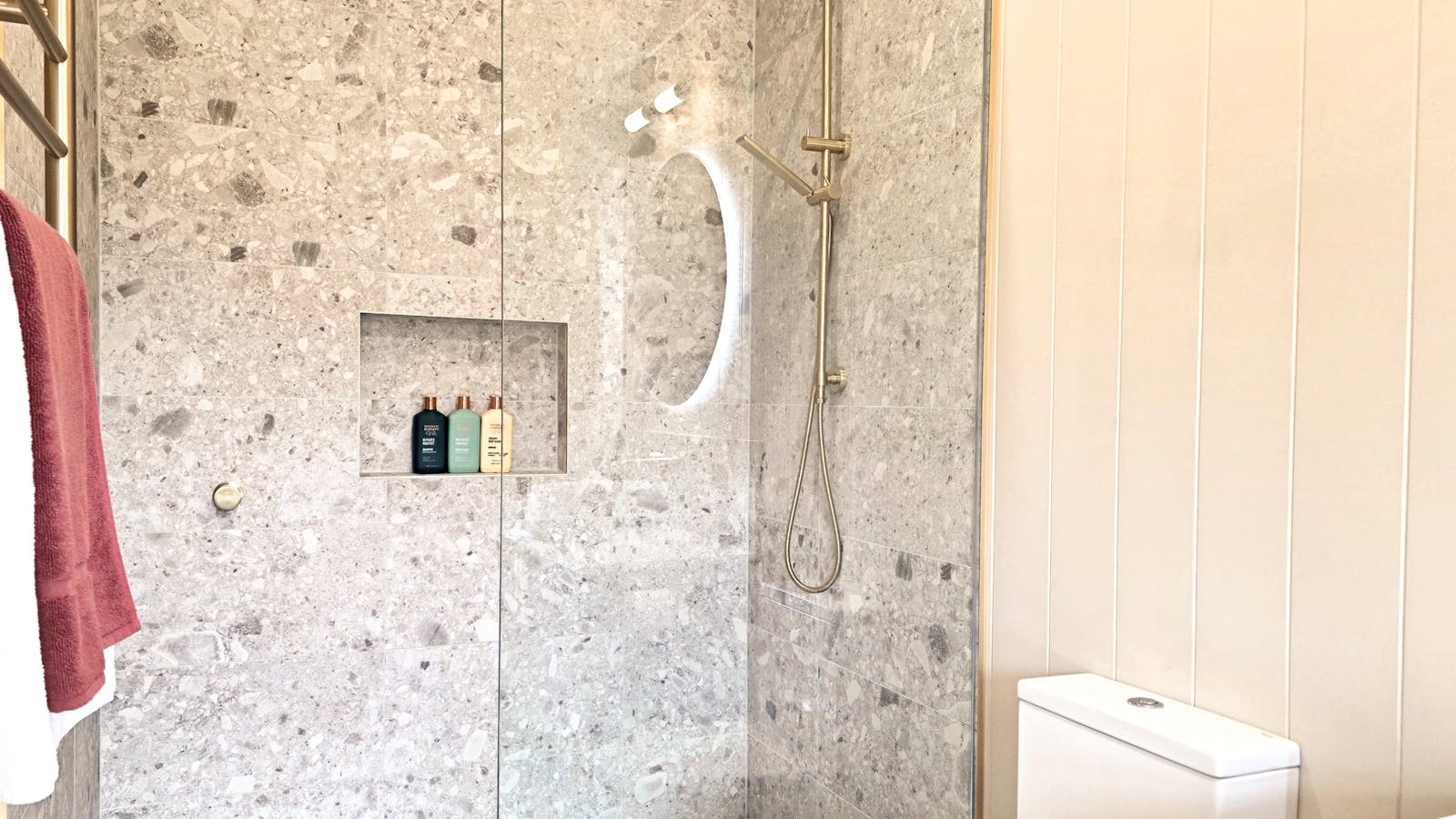 A spacious dual-head shower in the ensuite, complete with rain shower and eco toiletries