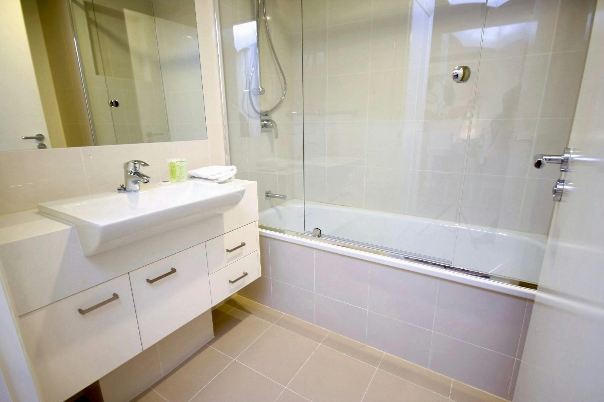 Modern bathroom with bathtub and shower