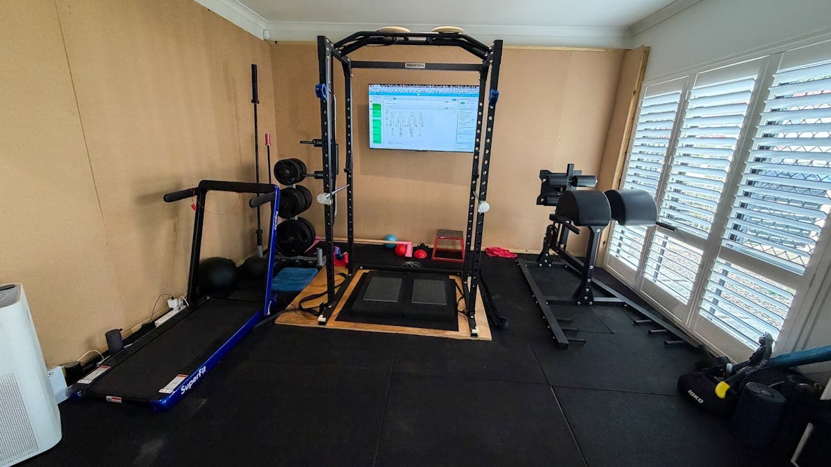 Heal Young Massage training room with strength rack and movement assessment equipment. Heal Young Massage training room with strength rack and movement assessment equipment.