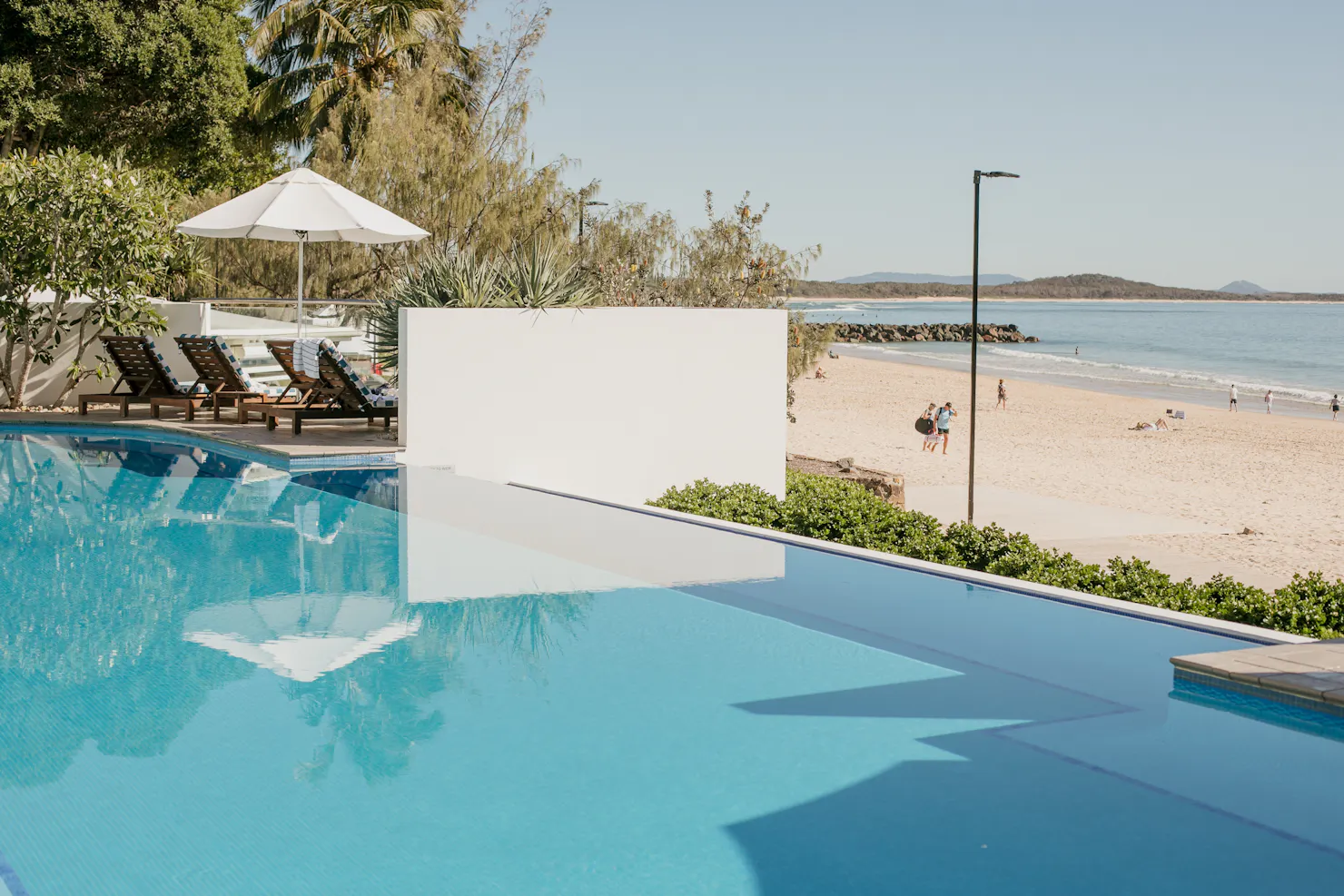 Newly renovated pool with beachfront access and view of main noosa beach