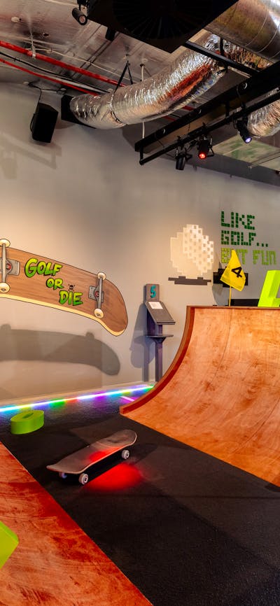 Mini golf in a half pipe is super radical