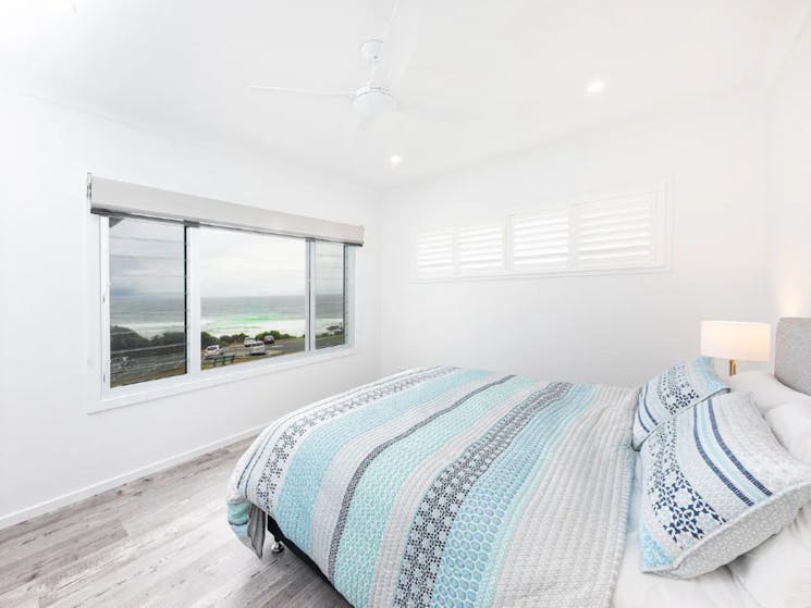 Master bedroom with Queen bed and beach views