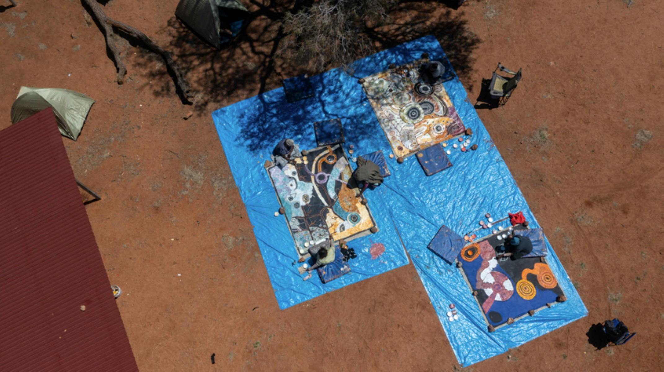 Mimili Maku artists during a bush camp at Parawalpi working on new collaborative paintings