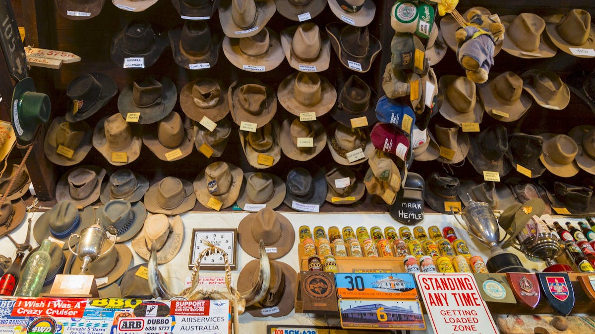 Hats over the front bar at Birdsville Hotel