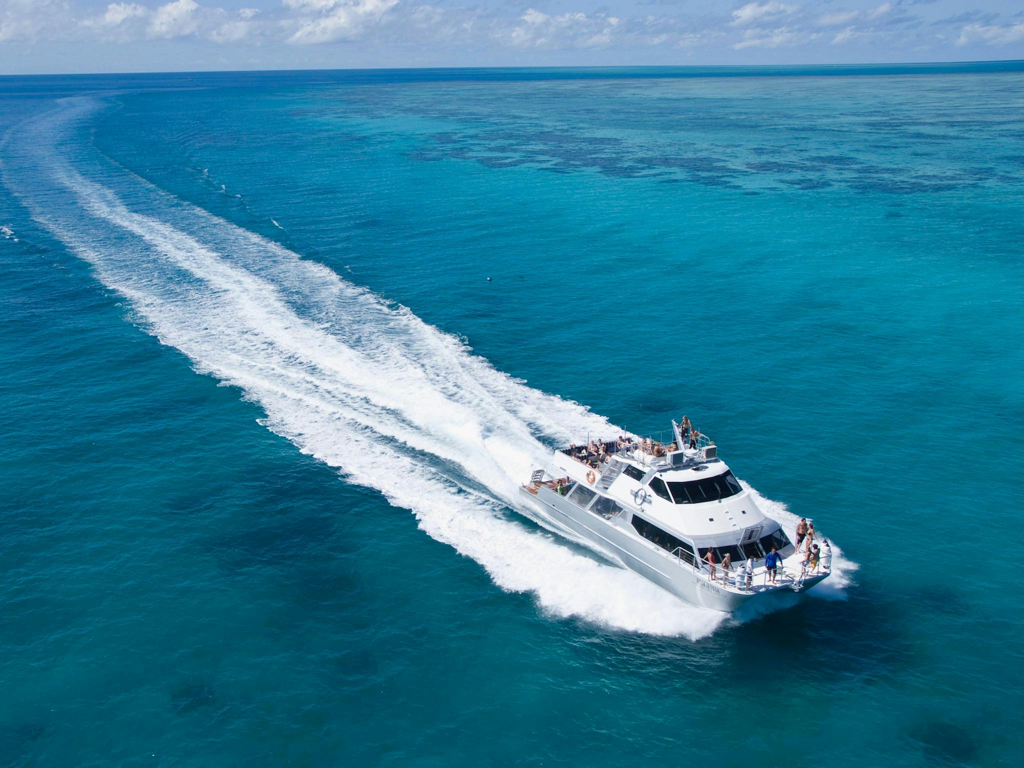 Ocean Freedom - Fast 20M Motor Catamaran - minimal travel time to Great Barrier Reef in Cairns Ocean Freedom - Fast 20M Motor Catamaran - minimal travel time to Great Barrier Reef in Cairns