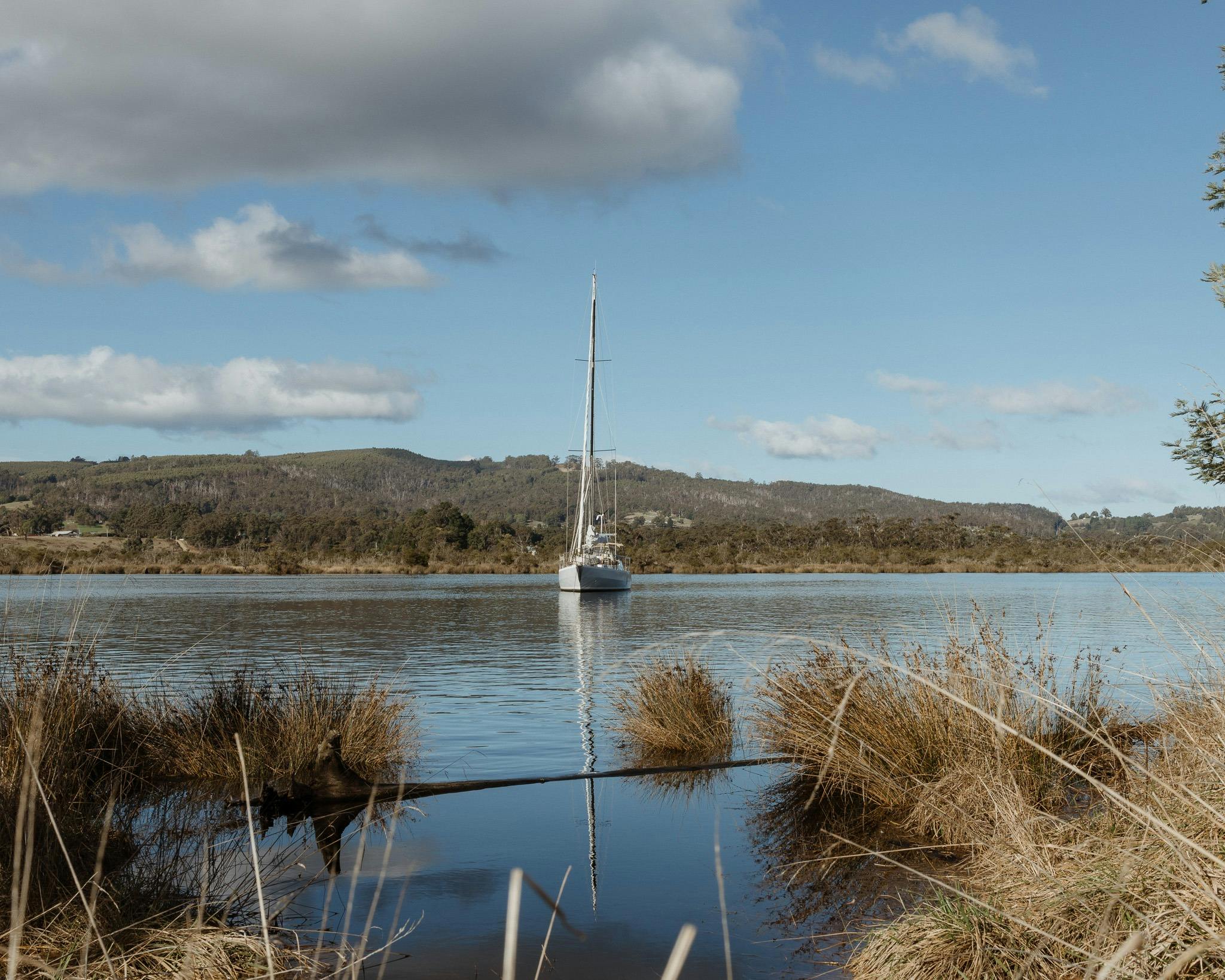 Boat reflections on the Huon River