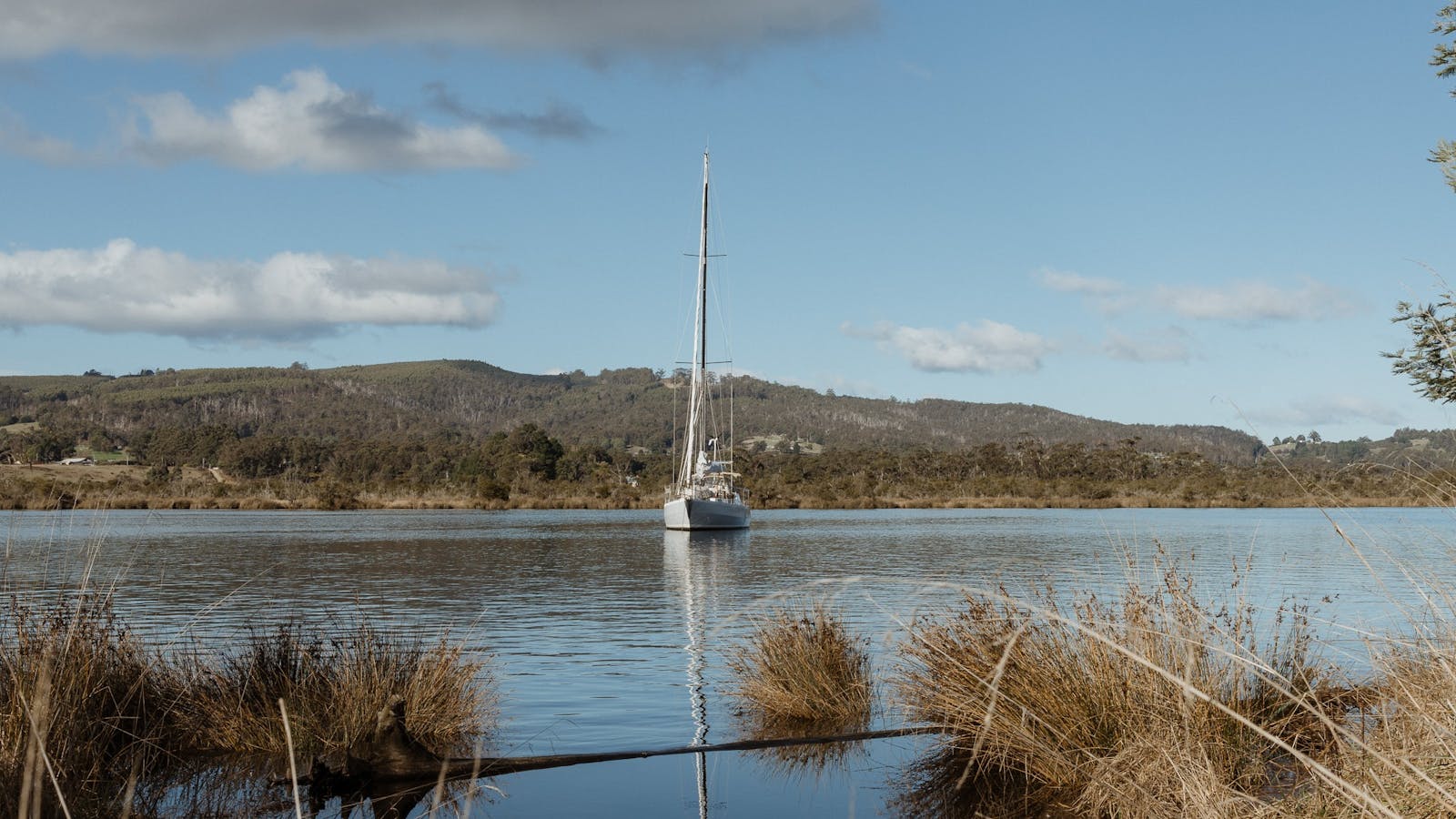 Boat reflections on the Huon River