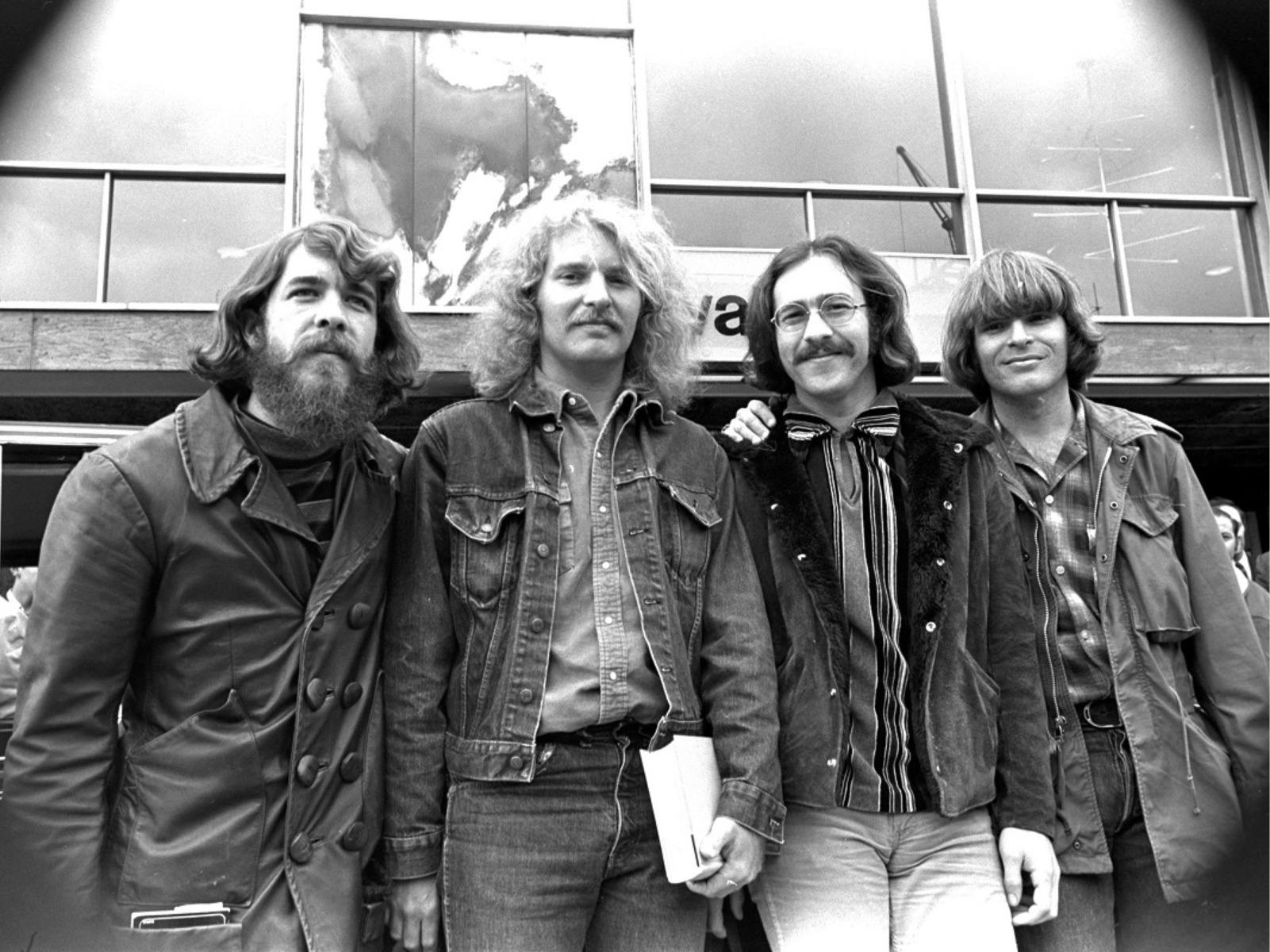 Crredence clearwater. Four man in a black and white picture