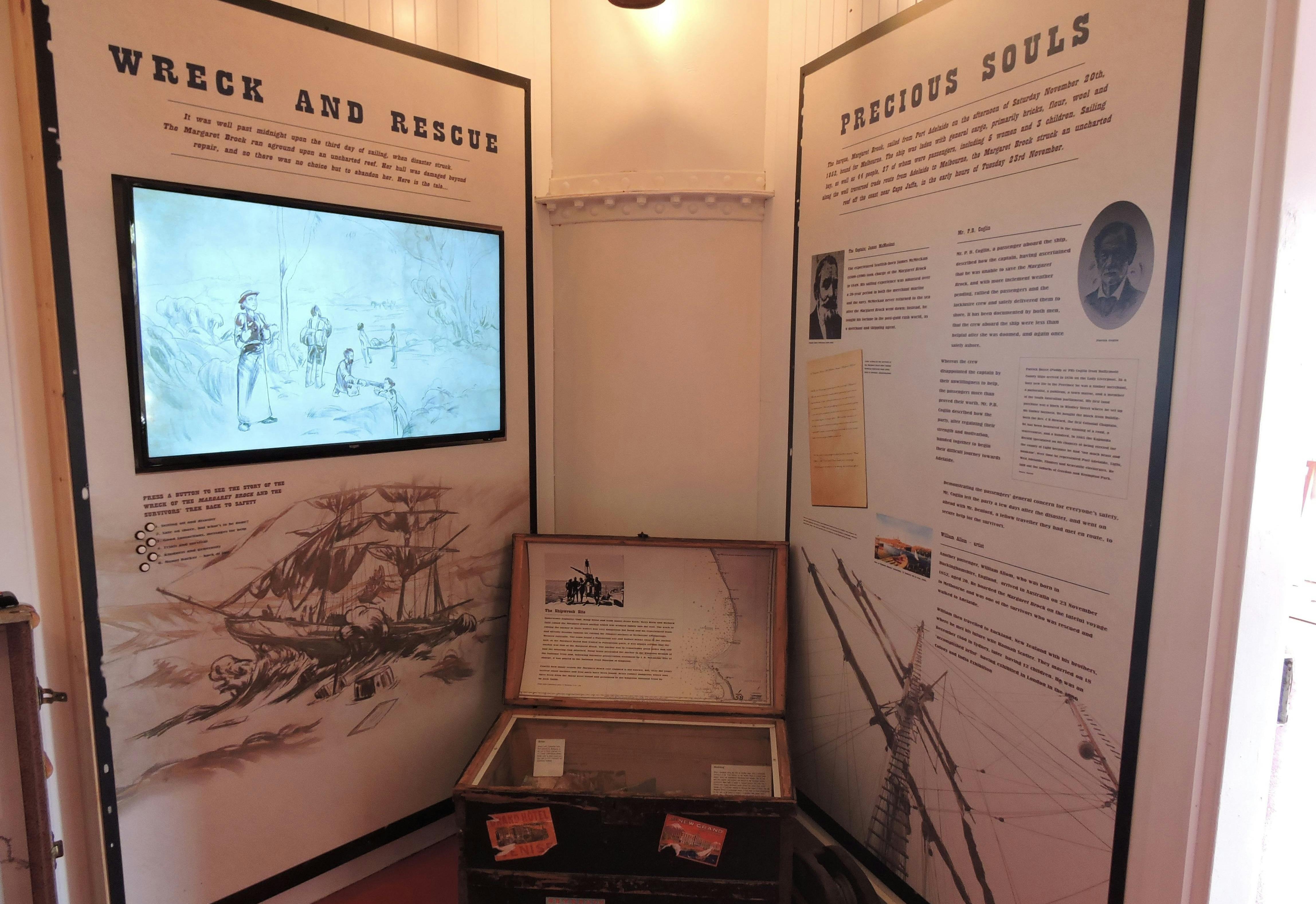 Hand-drawn illustrations on a monitor complement the narrated shipwreck story.  story