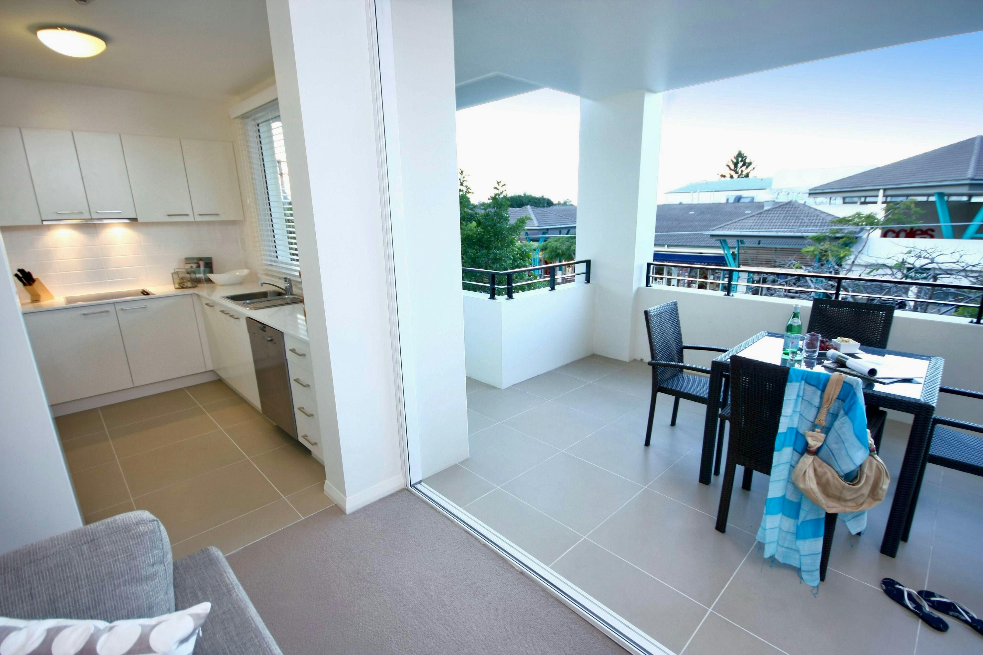 Kitchen and balcony with views over Racecourse Road